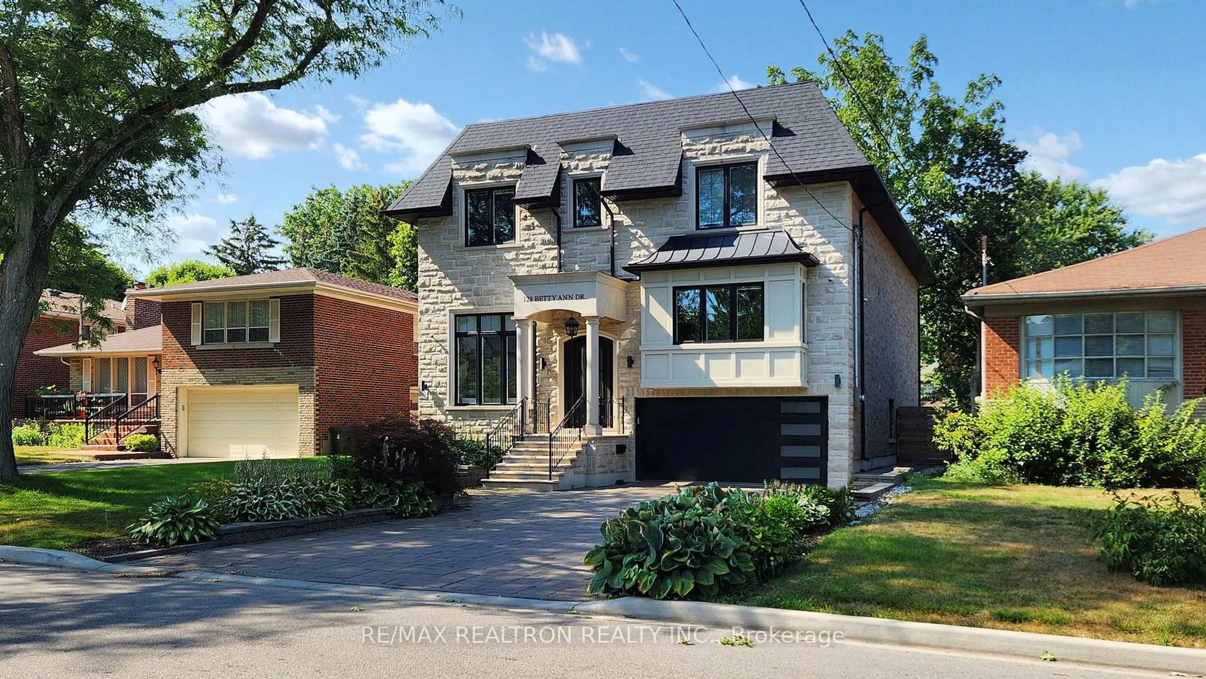 Home with brick exterior material, street for 128 Betty Ann Dr, Toronto Ontario M2N 1X4