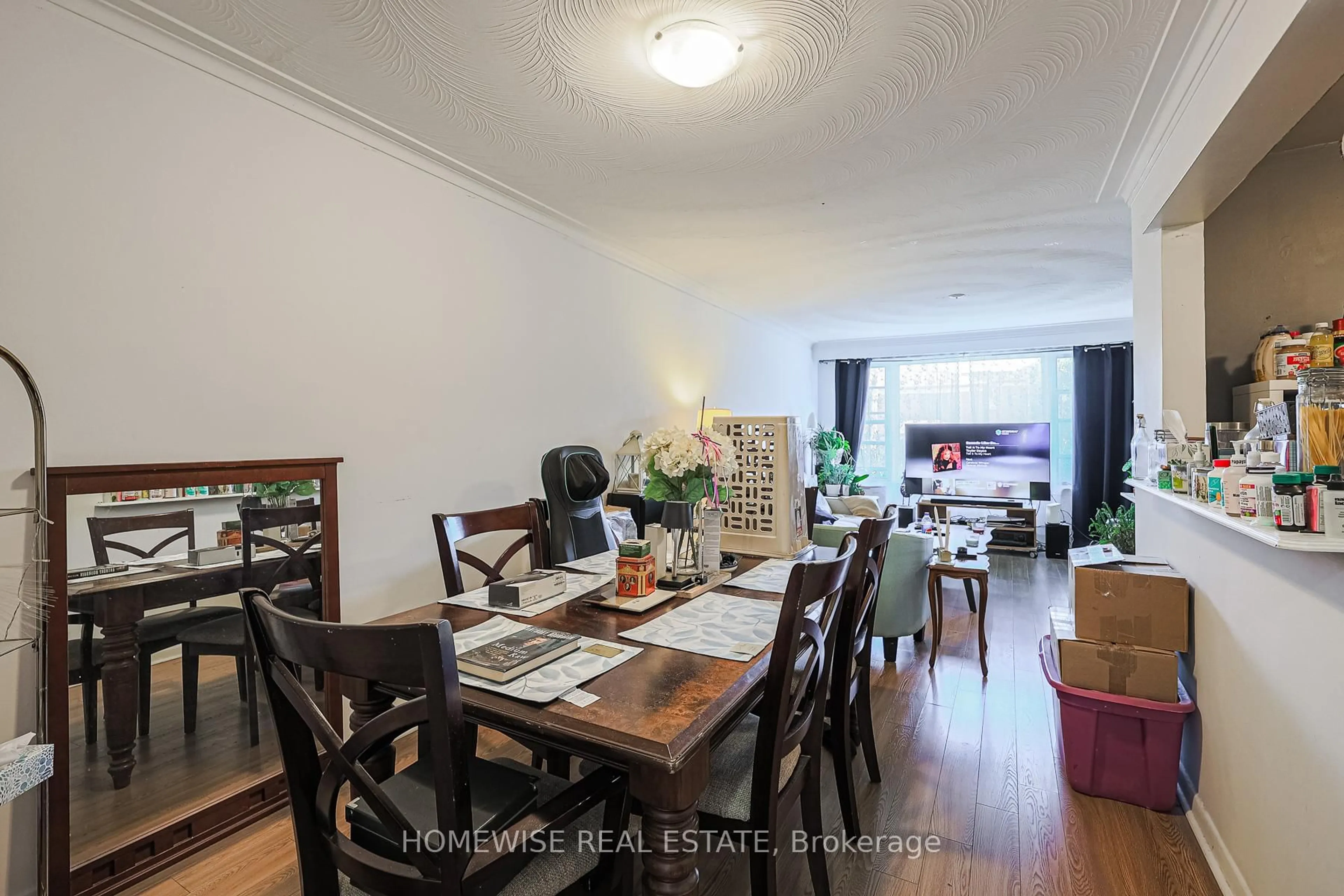 Dining room, wood/laminate floor for 4 Lanark Ave, Toronto Ontario M6C 2B3