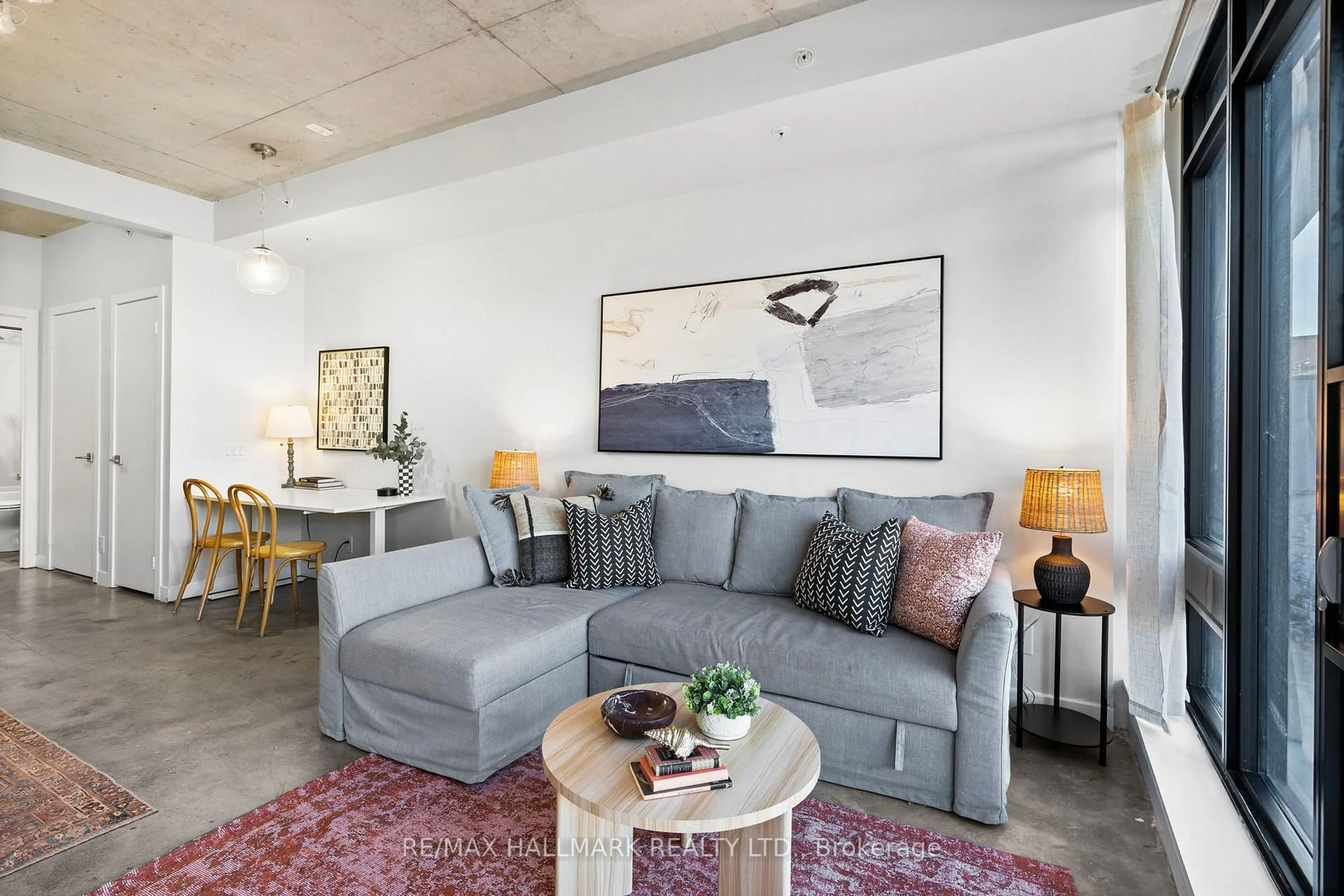 Living room with furniture, unknown for 1239 Dundas St #207, Toronto Ontario M6J 1X6