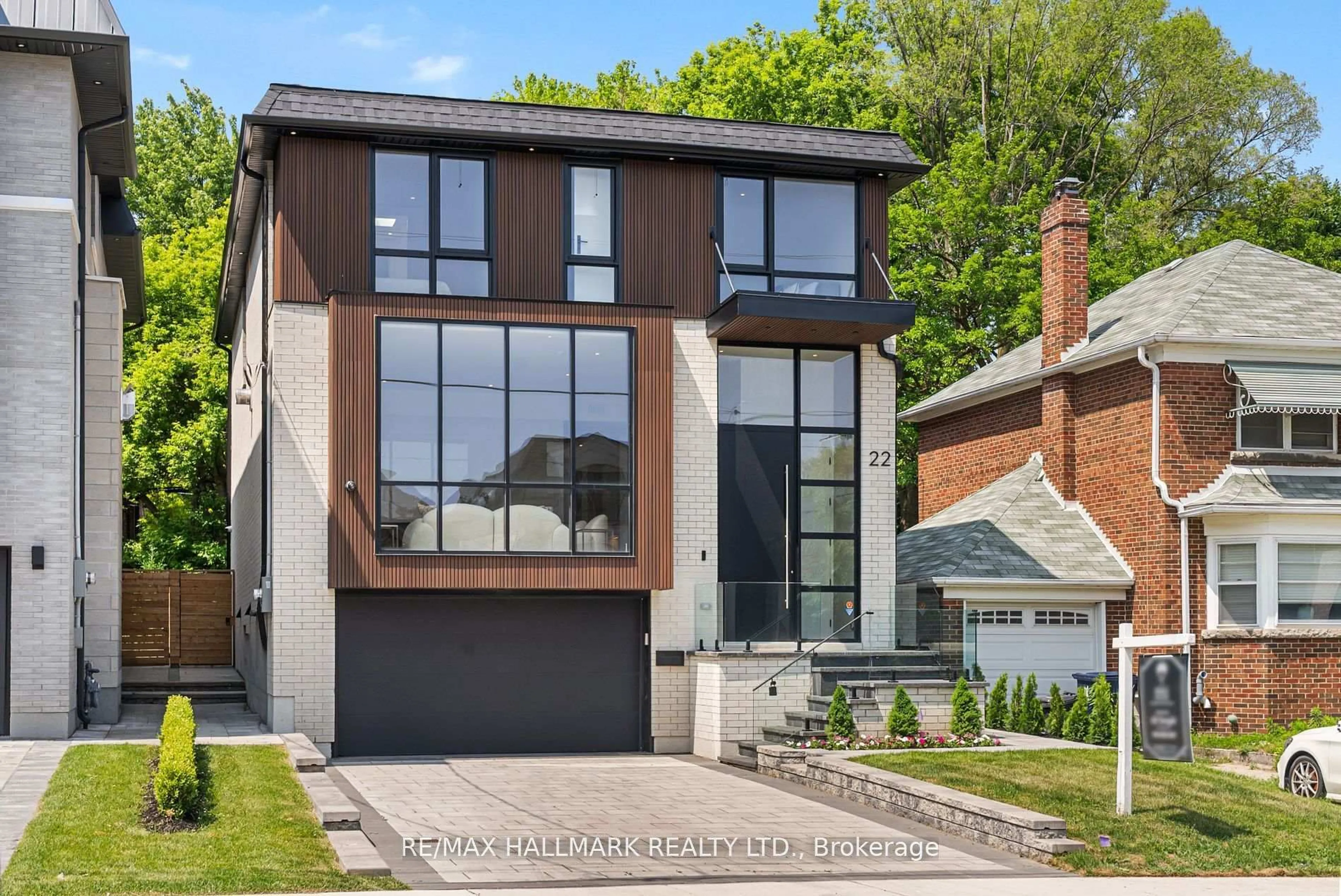 Home with brick exterior material, street for 22 Divadale Dr, Toronto Ontario M4G 2N9