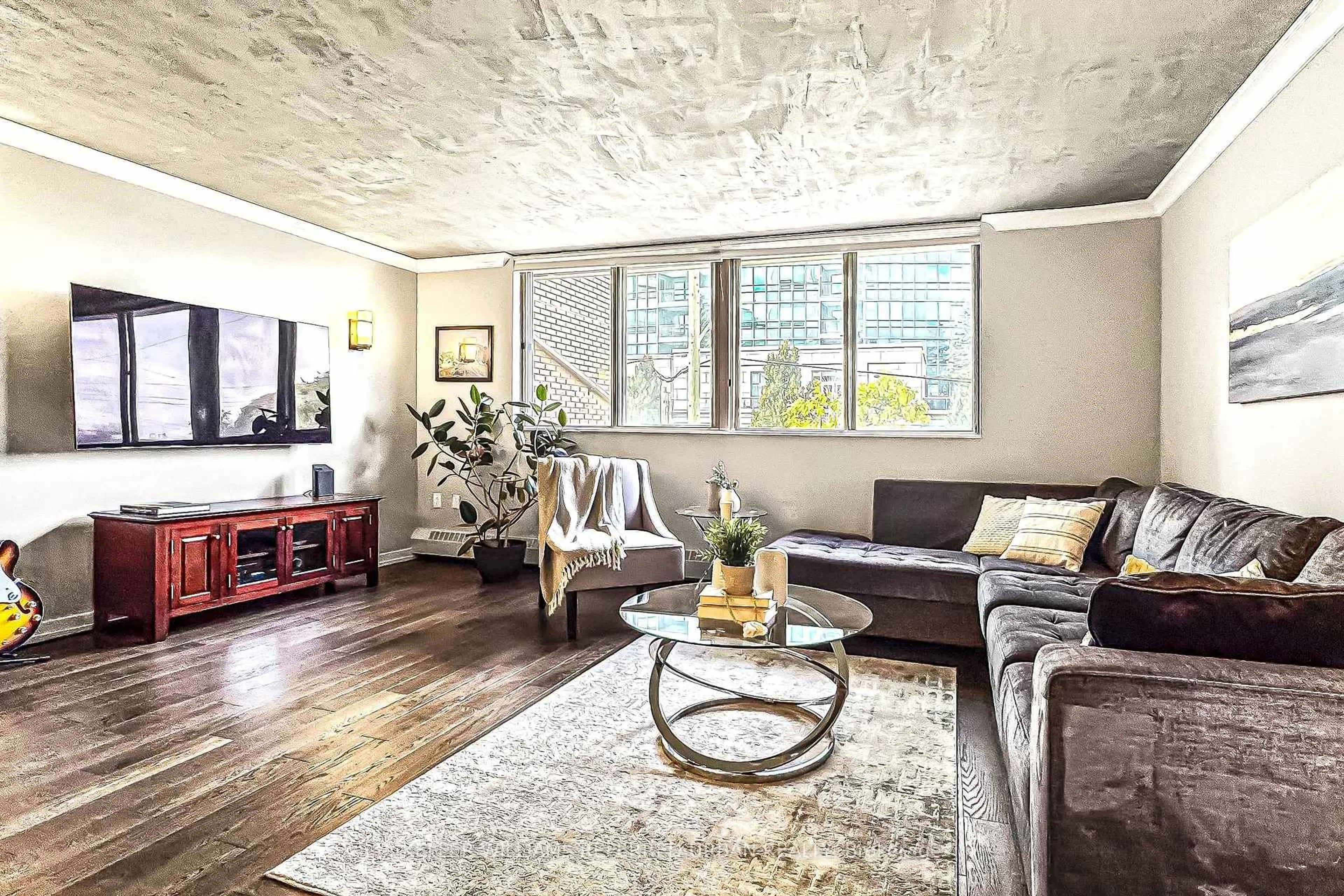 Living room with furniture, unknown for 3 Duplex Ave #205, Toronto Ontario M2M 4G6