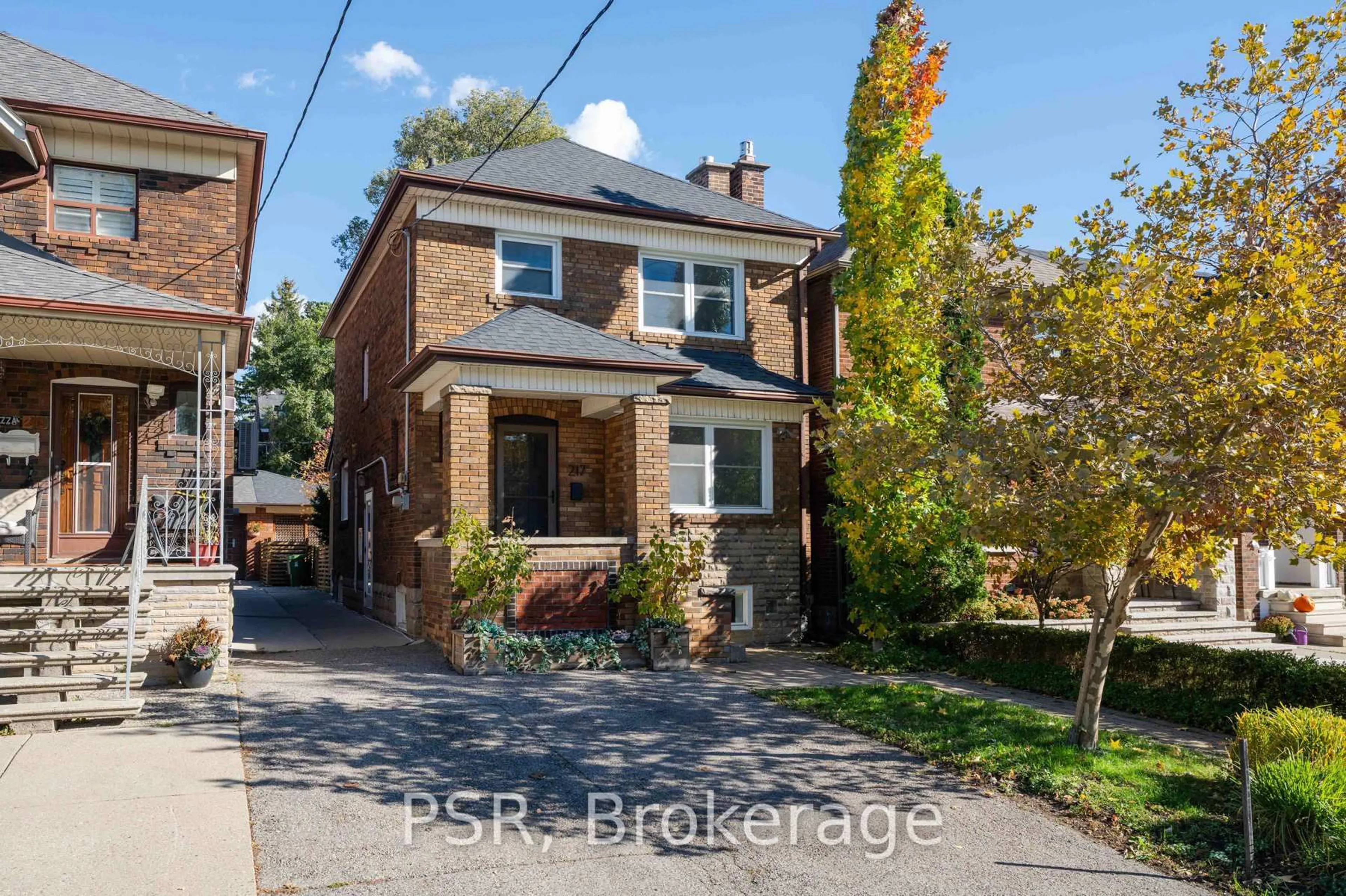 Home with brick exterior material, street for 217 Northcliffe Blvd, Toronto Ontario M6E 3K8