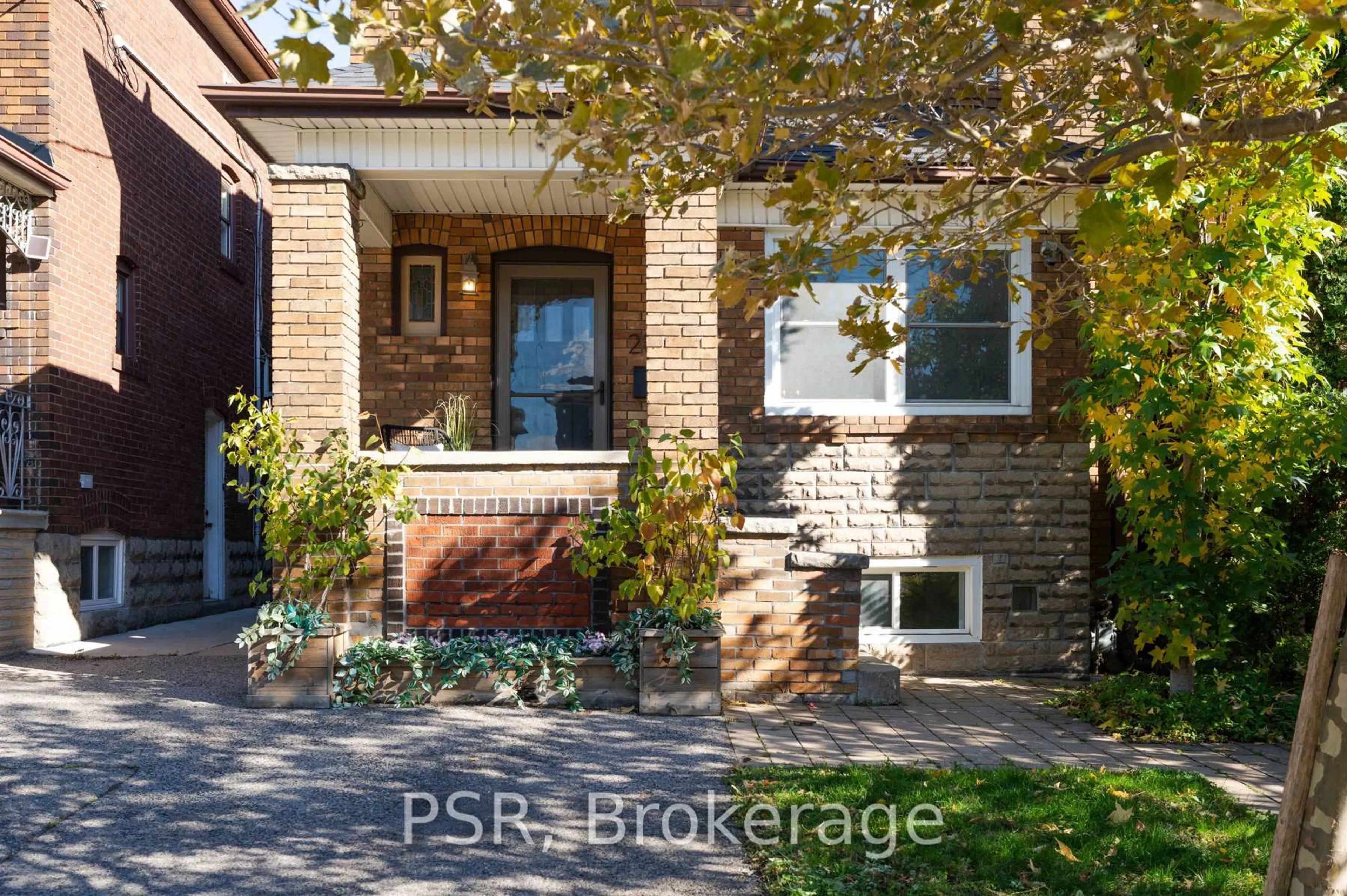 Home with brick exterior material, street for 217 Northcliffe Blvd, Toronto Ontario M6E 3K8