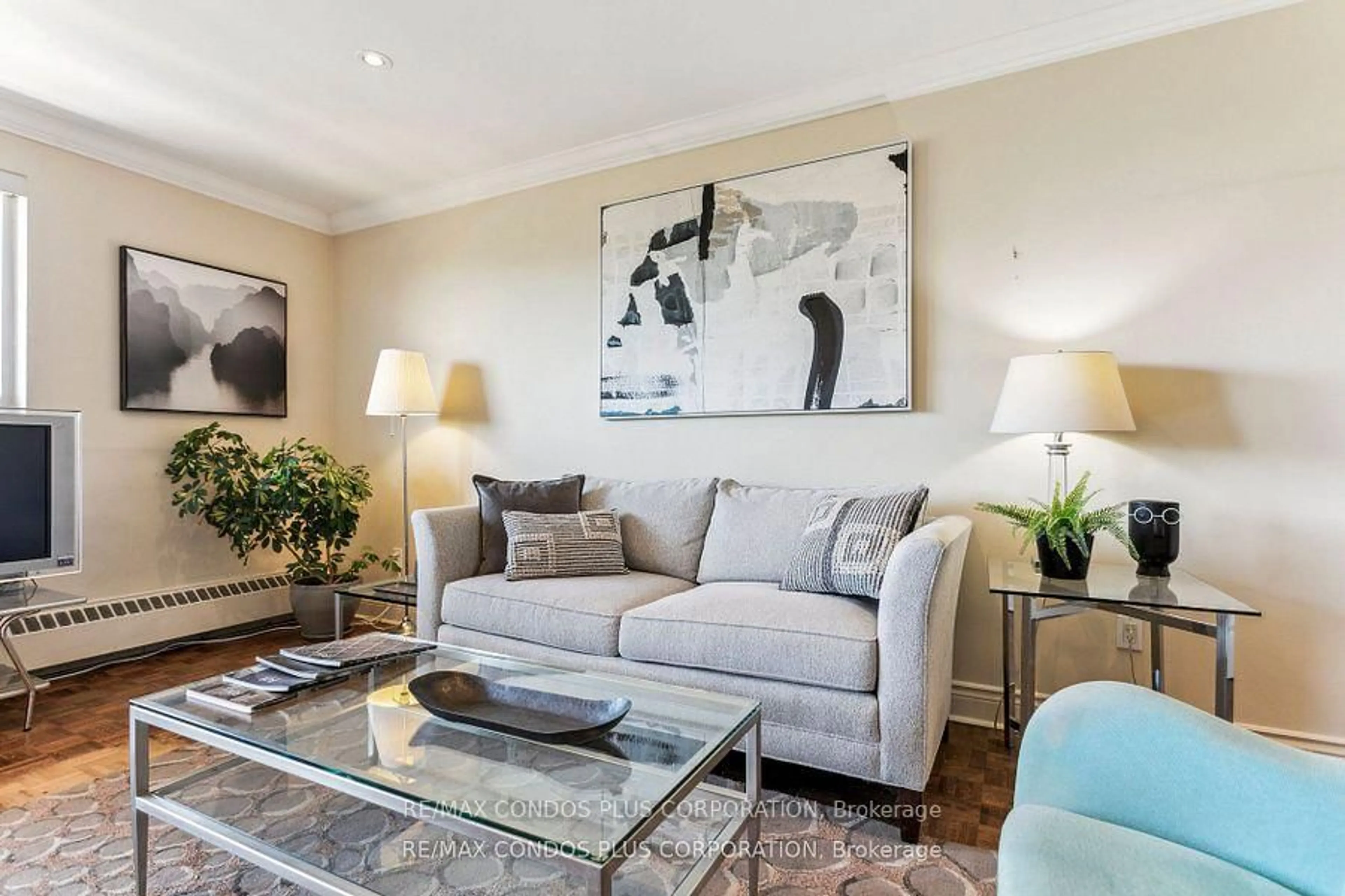 Living room with furniture, unknown for 71 Jonesville Cres #409, Toronto Ontario M4A 1H1