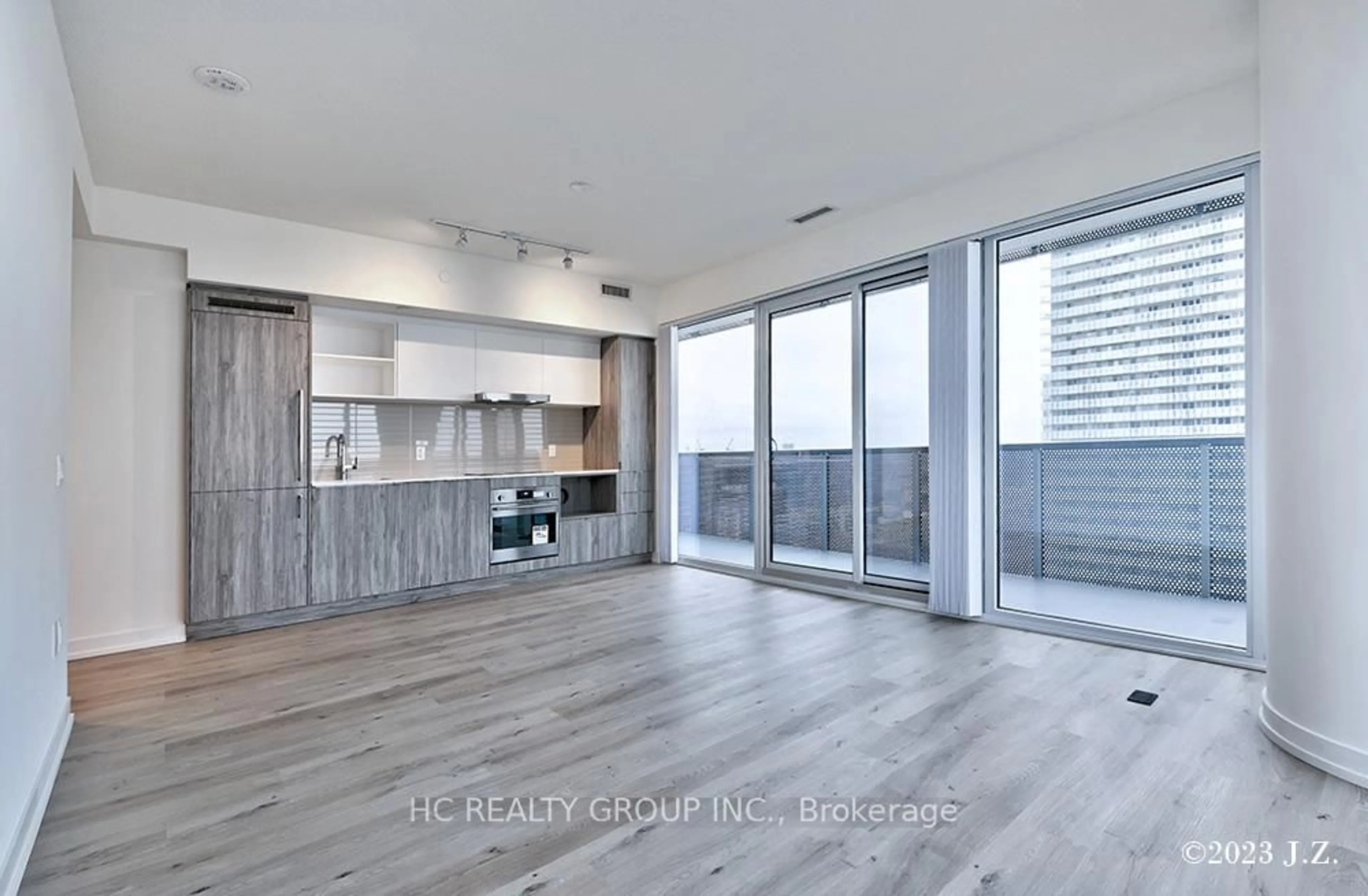 Open concept kitchen, wood/laminate floor for 138 Downes St #3907, Toronto Ontario M5E 0E4