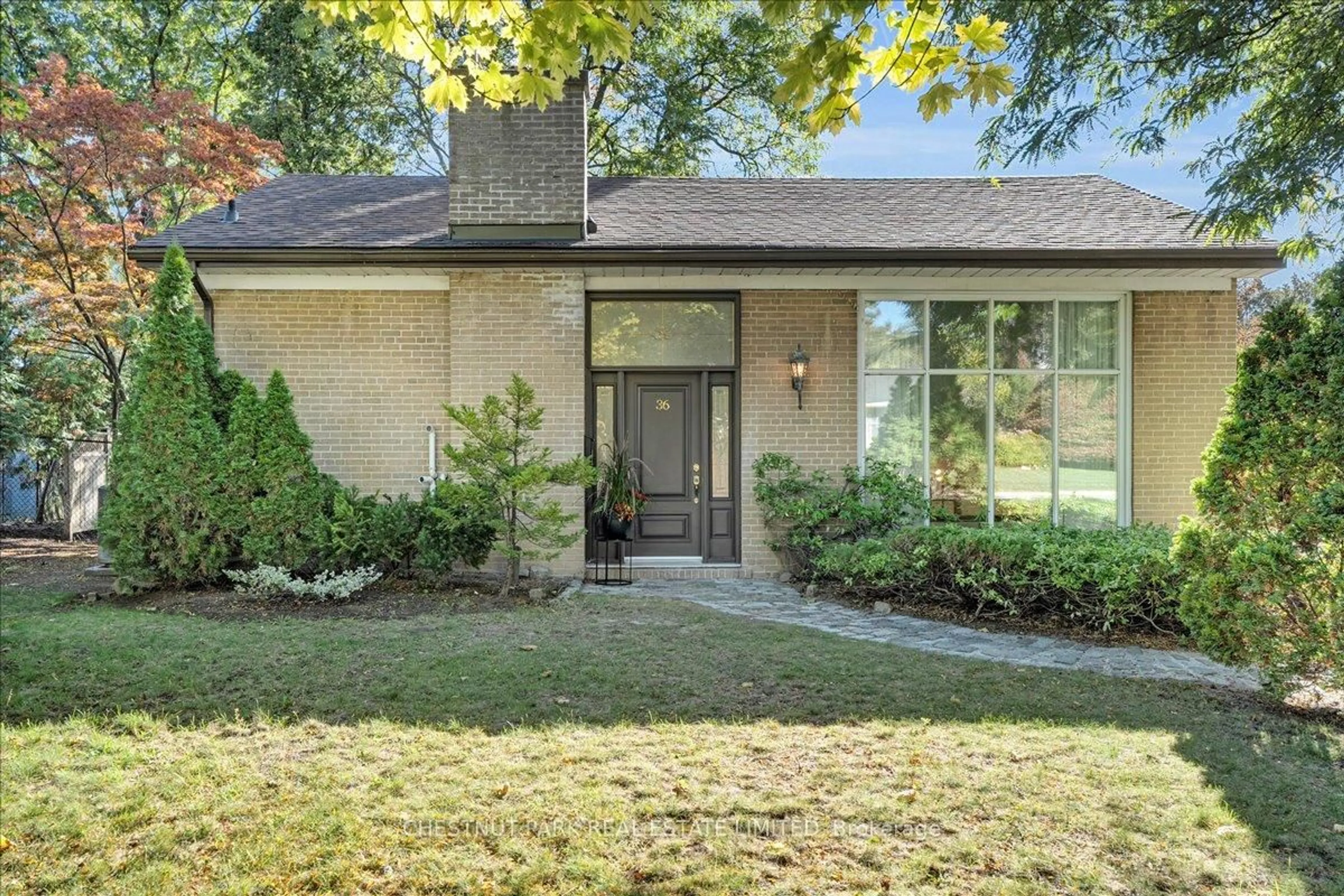 Home with brick exterior material, street for 36 Tangmere Rd, Toronto Ontario M3B 2N3