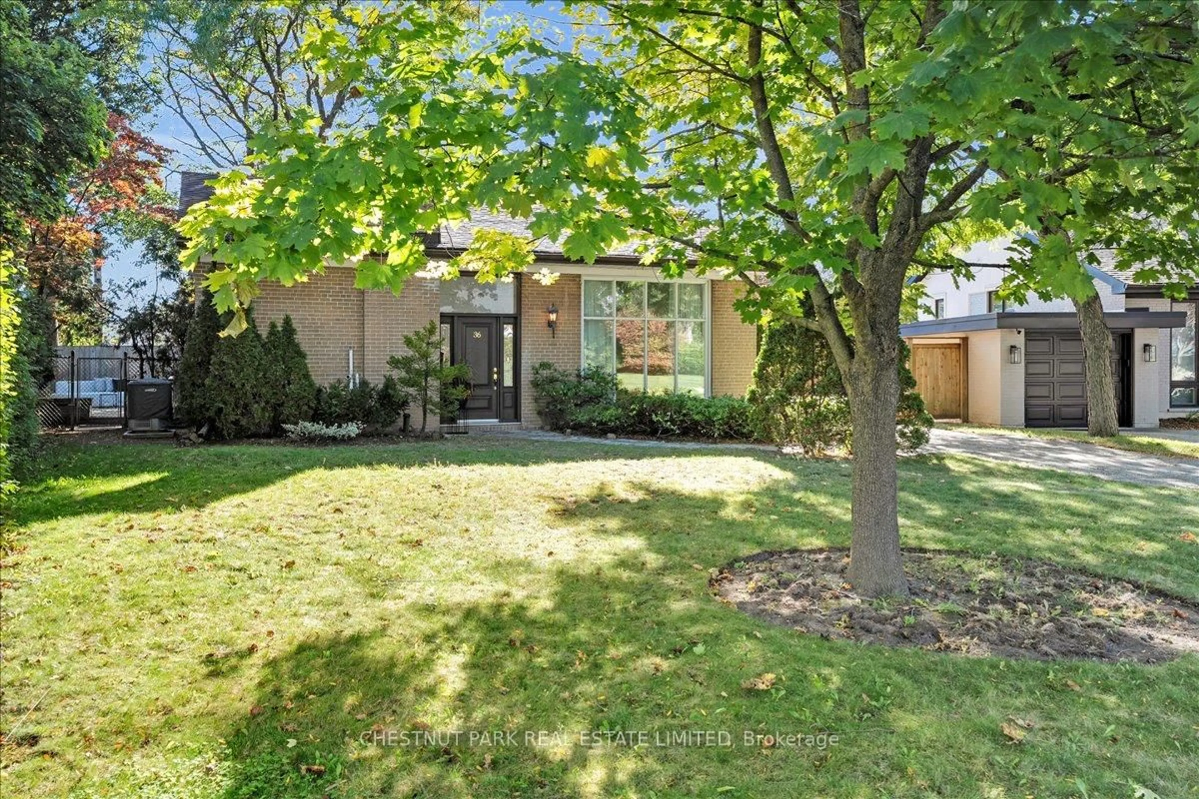 A pic from outside/outdoor area/front of a property/back of a property/a pic from drone, street for 36 Tangmere Rd, Toronto Ontario M3B 2N3