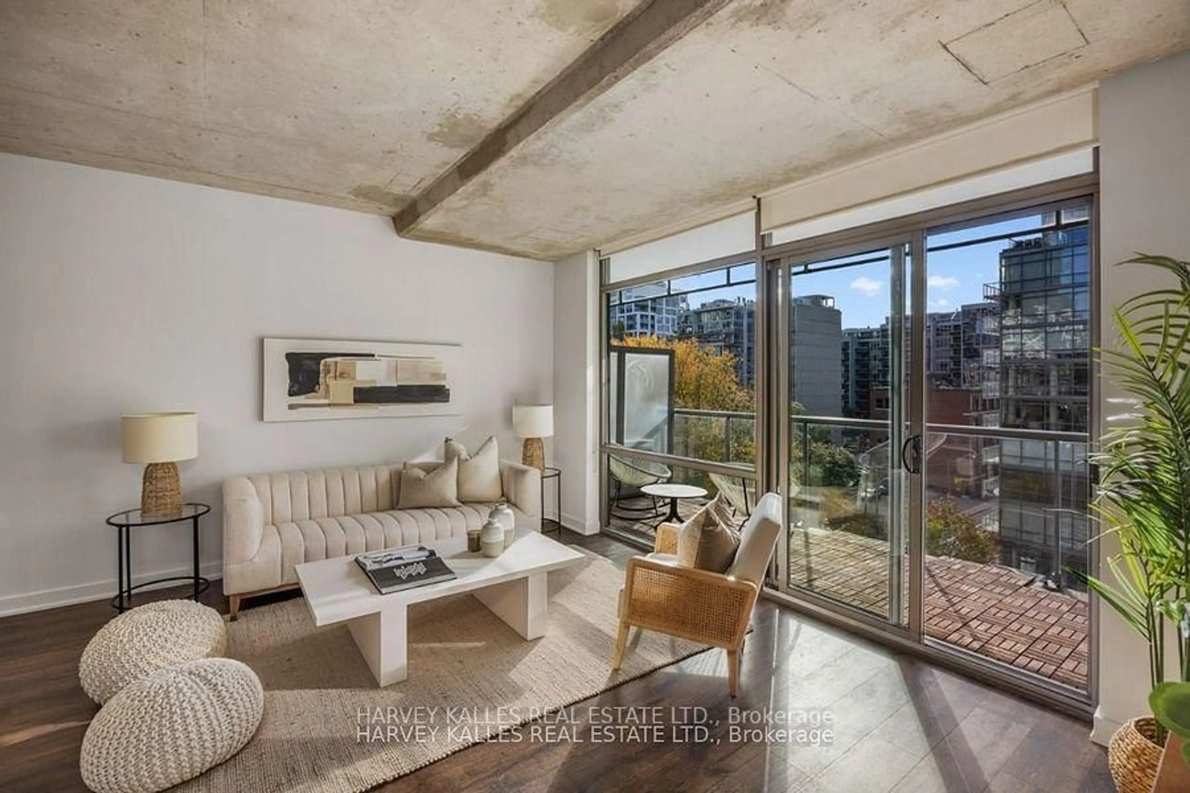 Living room with furniture, cement floor for 55 Stewart St #723, Toronto Ontario M5V 2V1