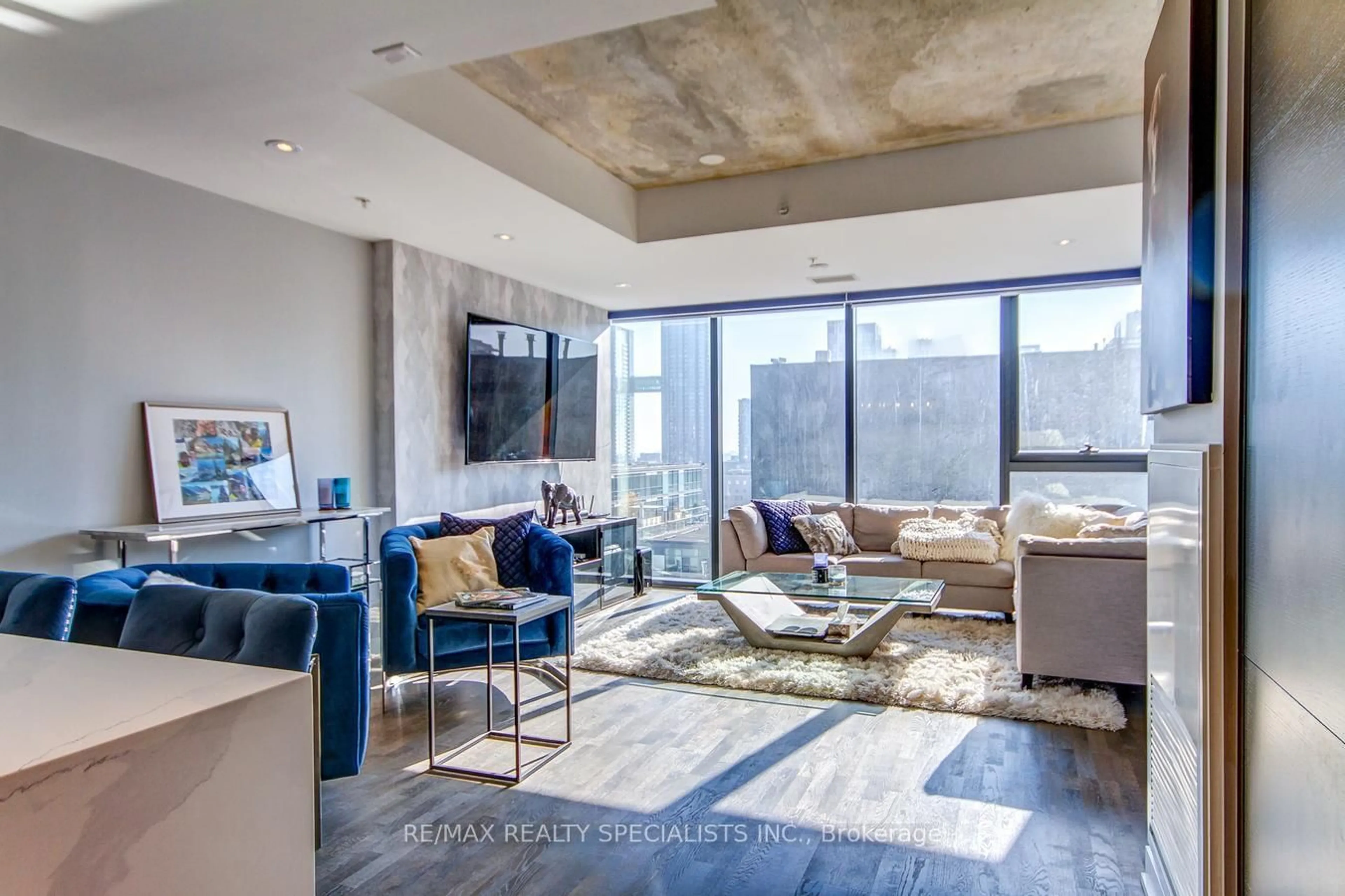 Living room with furniture, cement floor for 629 King St #1227, Toronto Ontario M5V 1M5