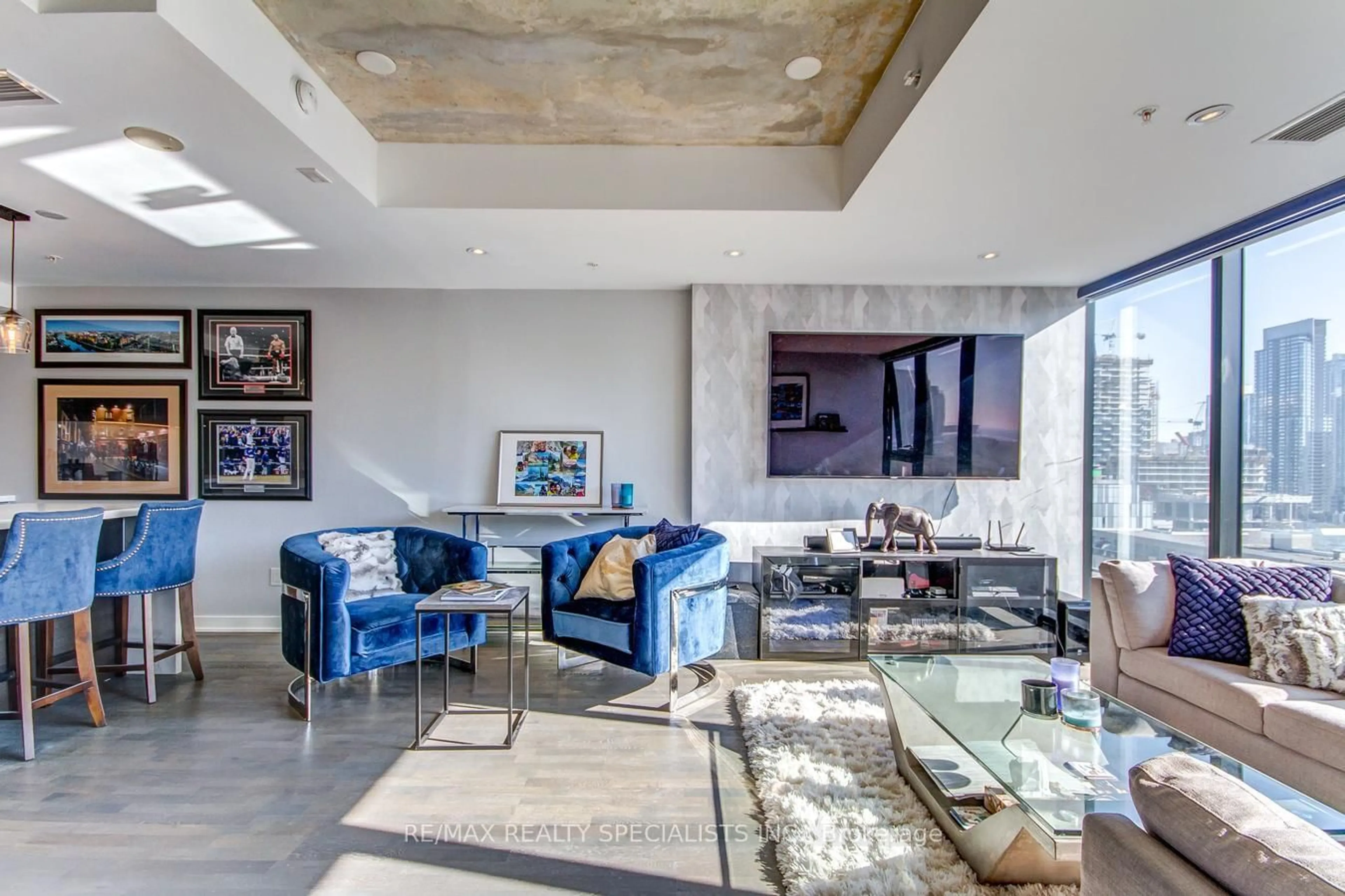 Living room with furniture, cement floor for 629 King St #1227, Toronto Ontario M5V 1M5