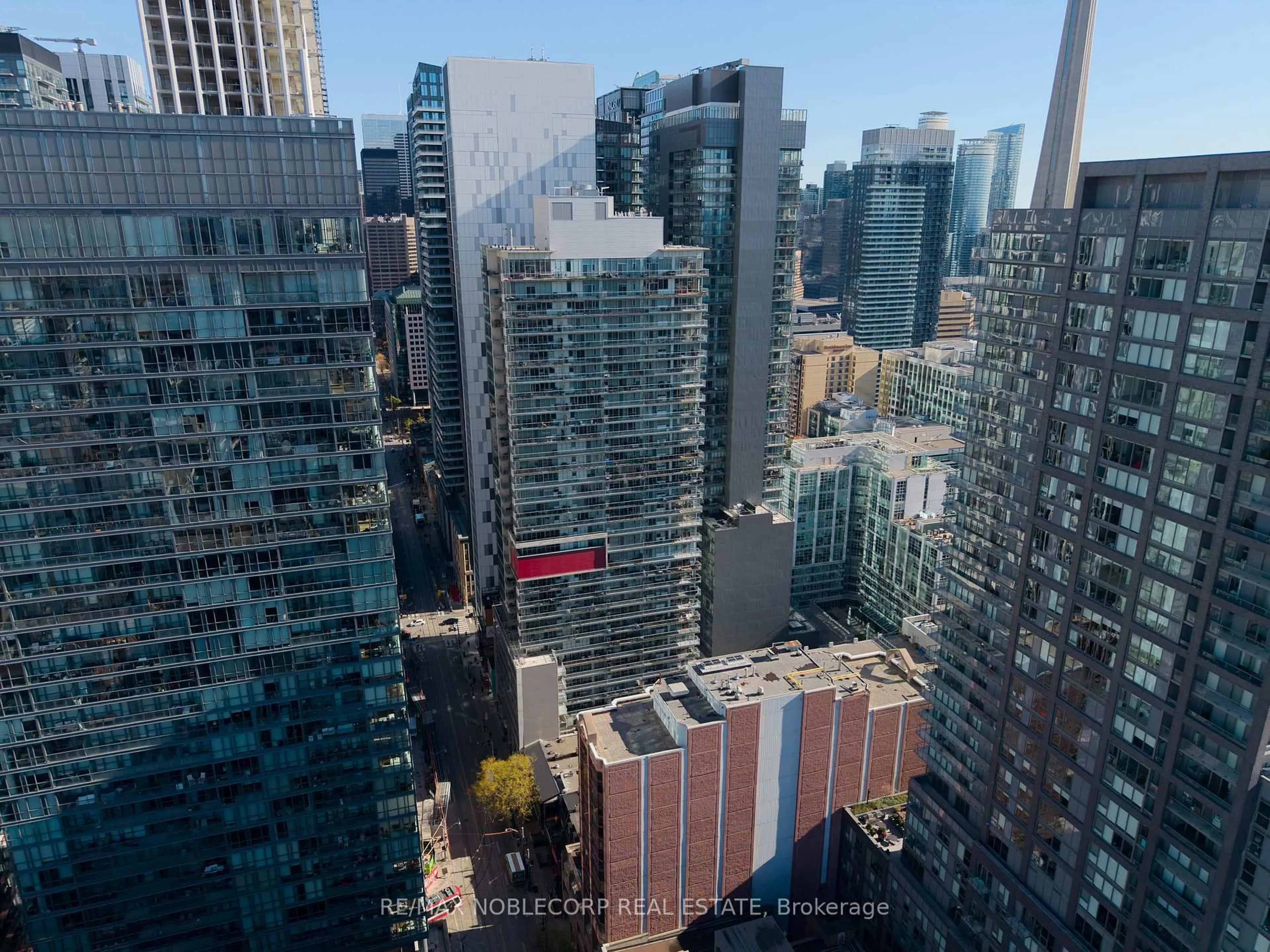 A pic from outside/outdoor area/front of a property/back of a property/a pic from drone, city buildings view from balcony for 375 King St #810, Toronto Ontario M5V 1K1