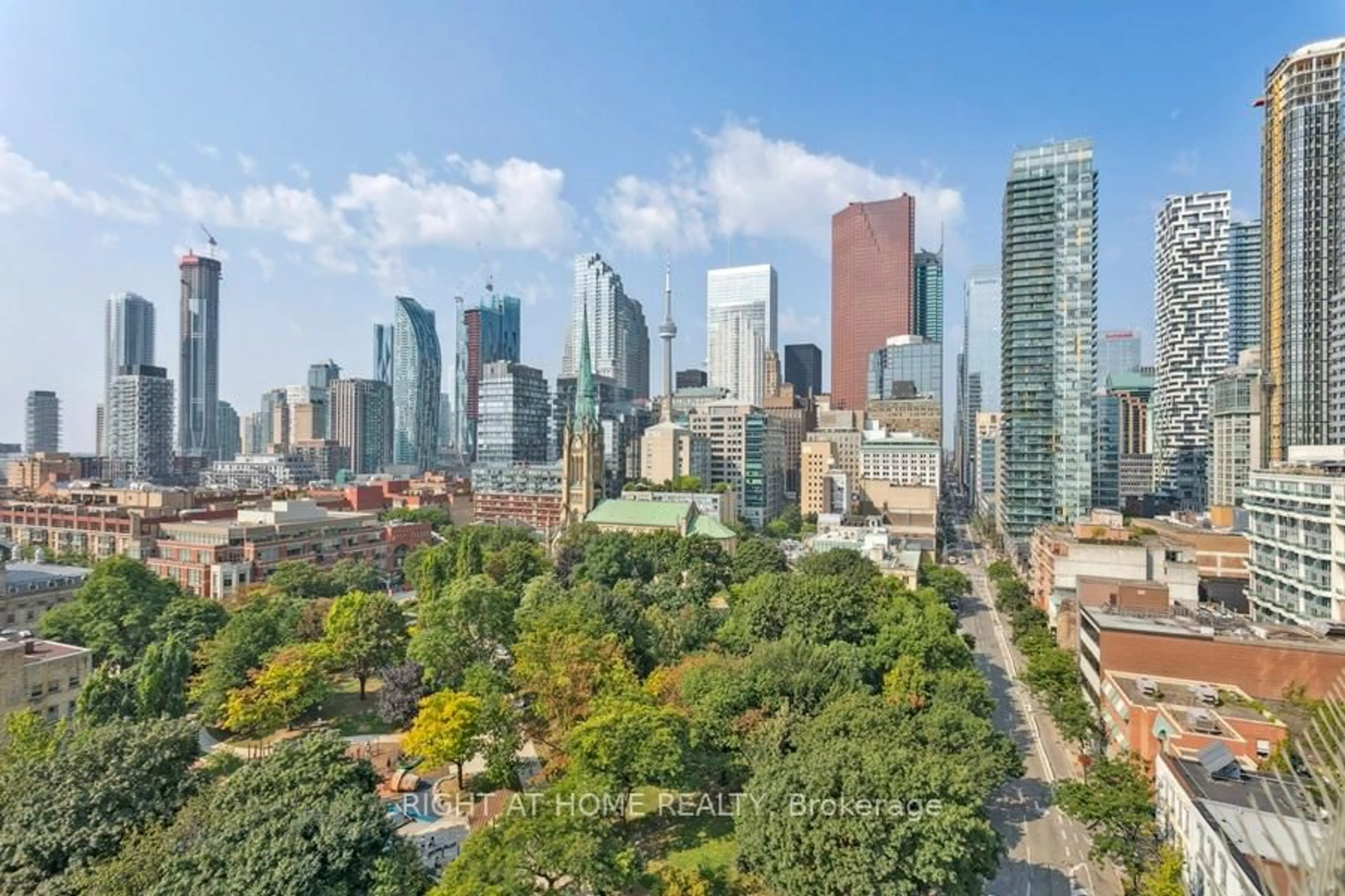 A pic from outside/outdoor area/front of a property/back of a property/a pic from drone, city buildings view from balcony for 112 George St #1204, Toronto Ontario M5A 2M5