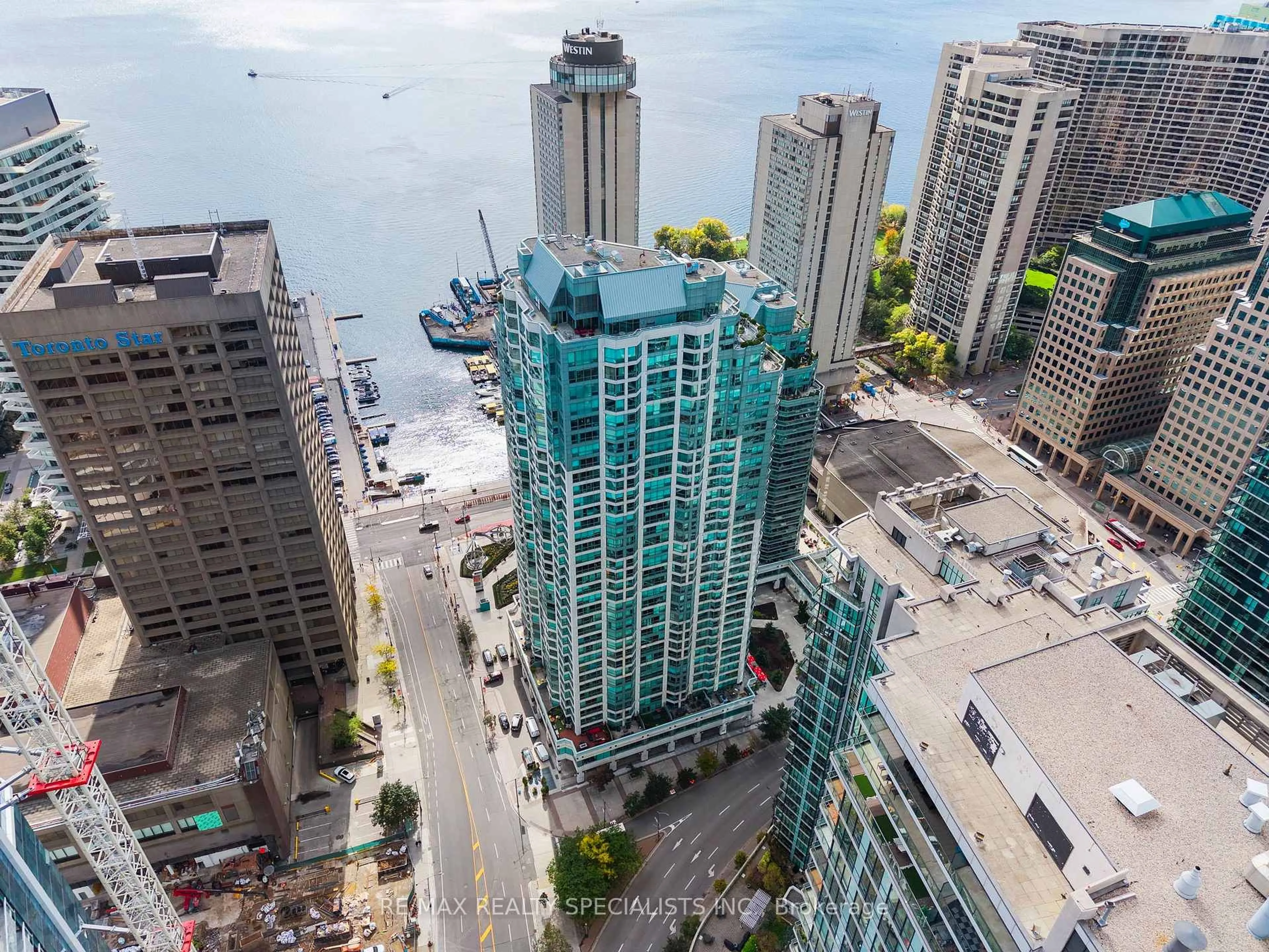 A pic from outside/outdoor area/front of a property/back of a property/a pic from drone, city buildings view from balcony for 10 Yonge St #710, Toronto Ontario M5E 1R4