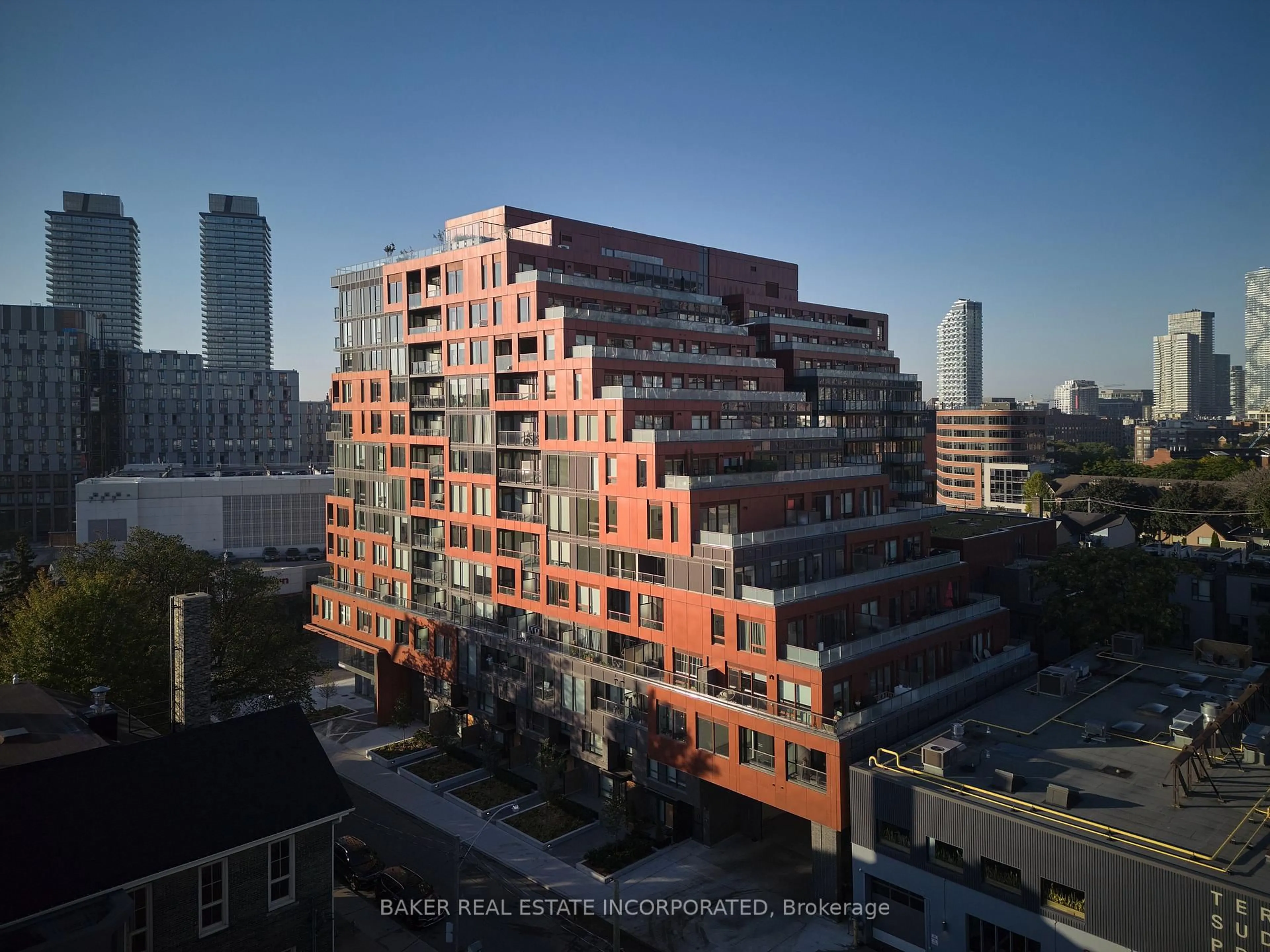 Home with brick exterior material, city buildings view from balcony for 28 Eastern Ave #328, Toronto Ontario M5A 0Y2