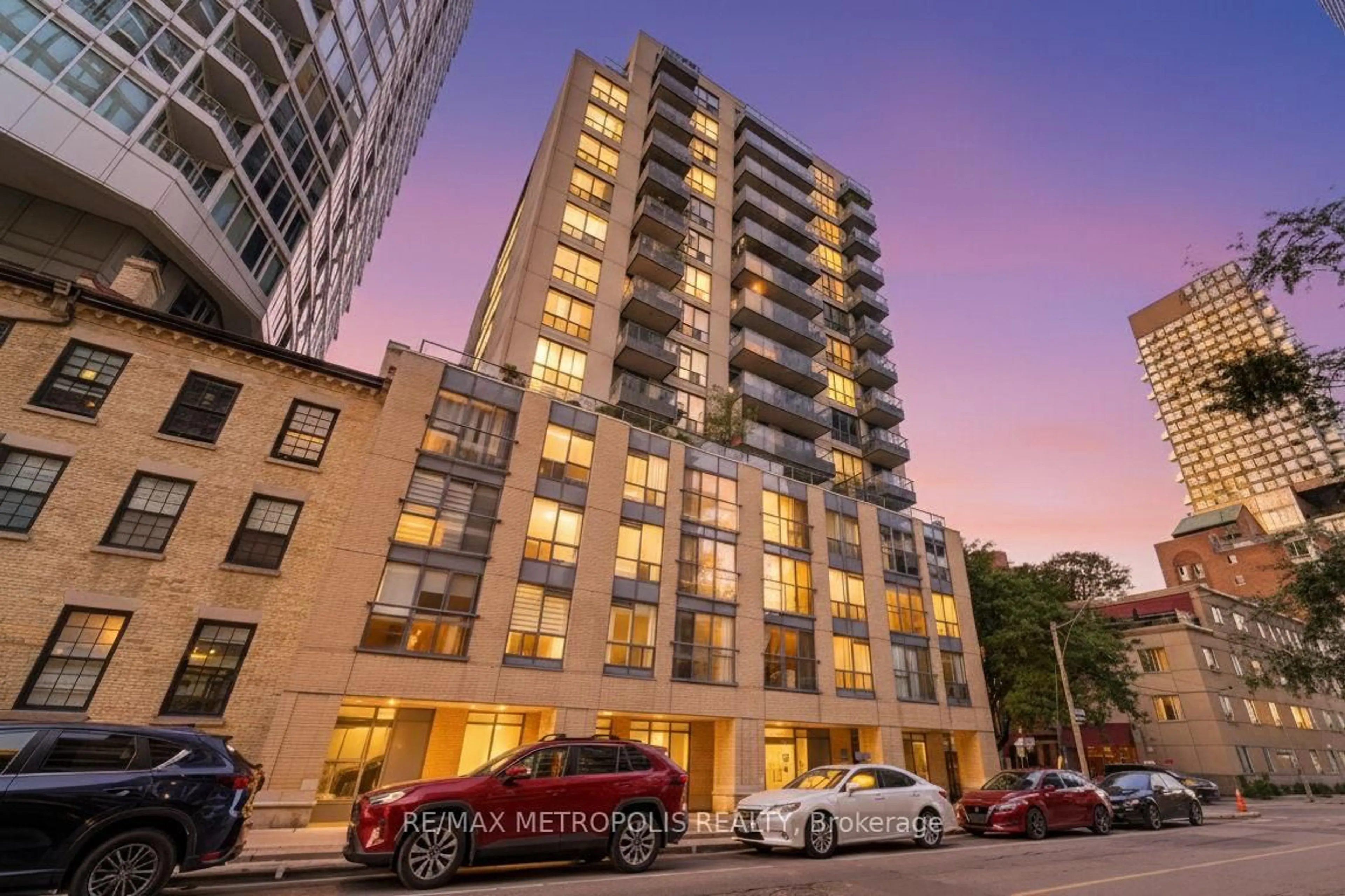 Patio, city buildings view from balcony for 76 Shuter St #1504, Toronto Ontario M5B 1B4