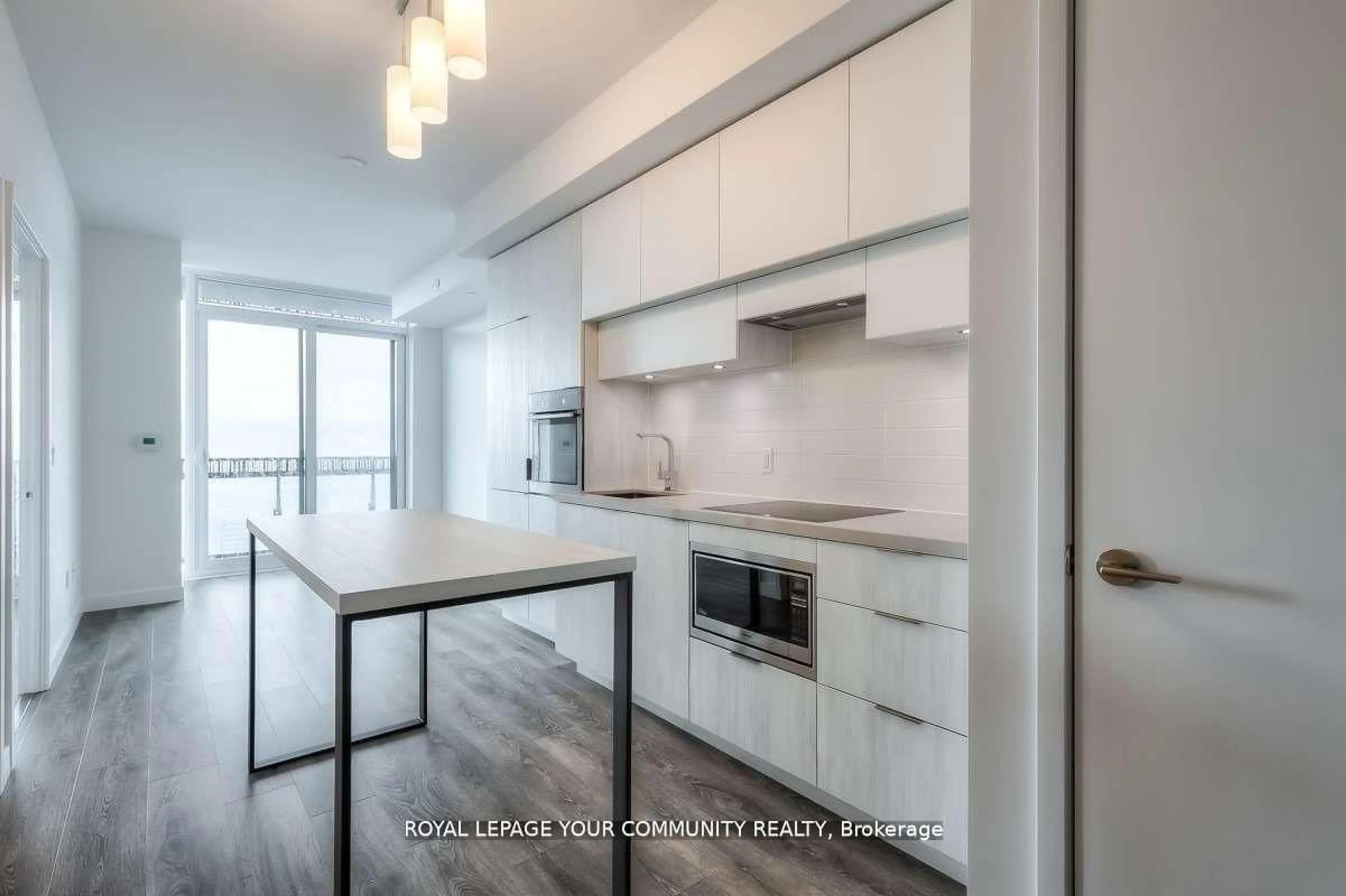 Open concept kitchen, wood/laminate floor for 8 Eglinton Ave #4209, Toronto Ontario M4P 1A6