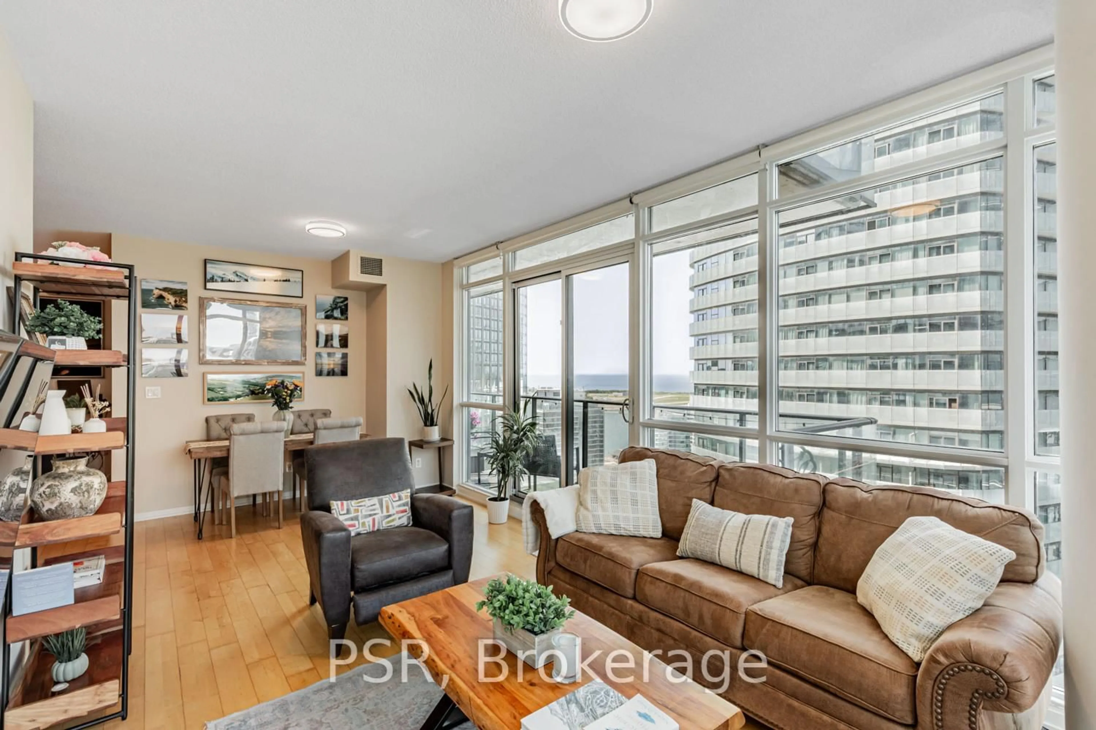 Living room with furniture, wood/laminate floor for 55 Bremner Blvd #3101, Toronto Ontario M5J 0A6