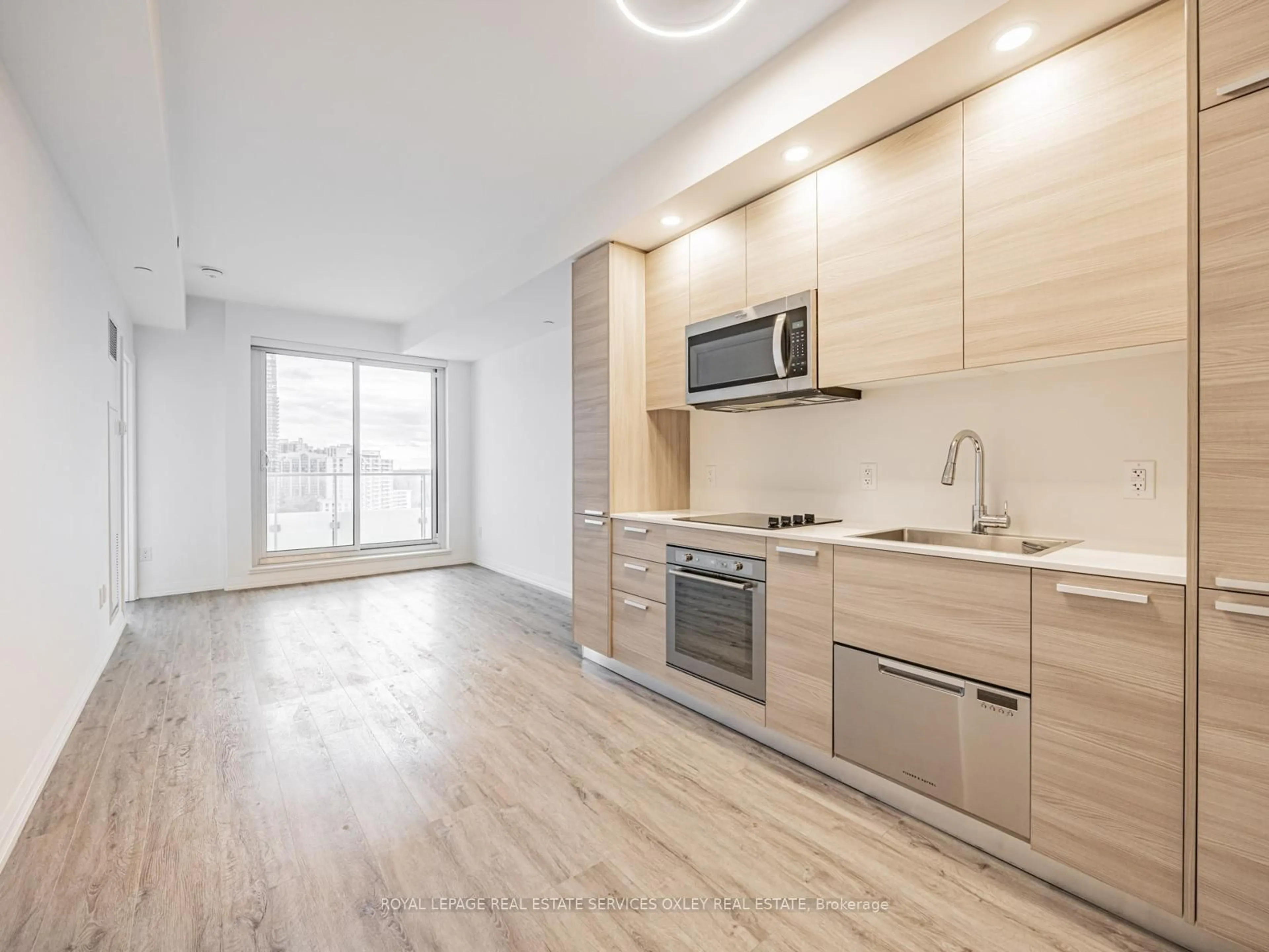 Open concept kitchen, wood/laminate floor for 75 Canterbury Pl #1603, Toronto Ontario M2N 2N1