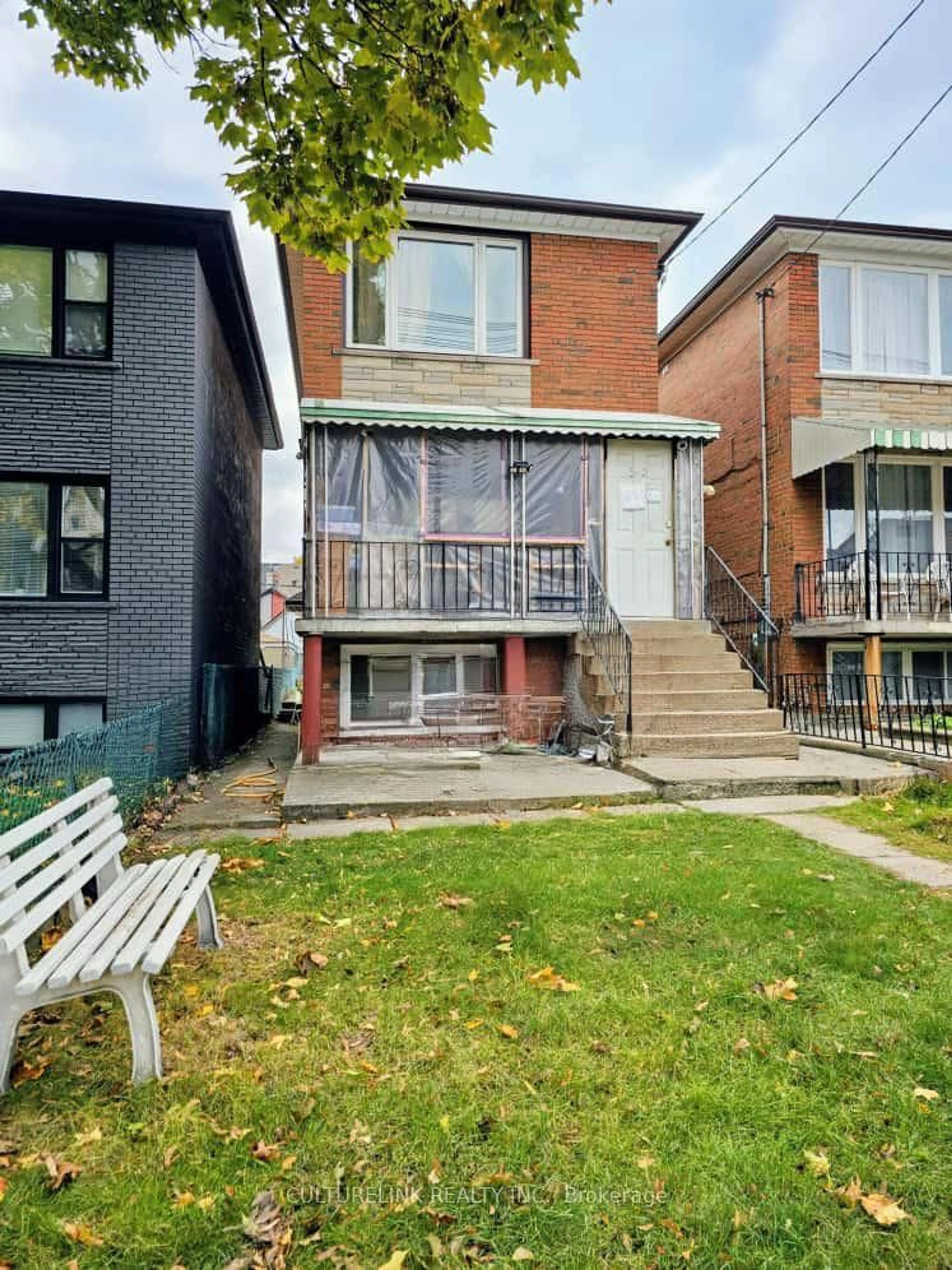 Home with brick exterior material, street for 52 Palmerston Ave, Toronto Ontario M6J 2J1