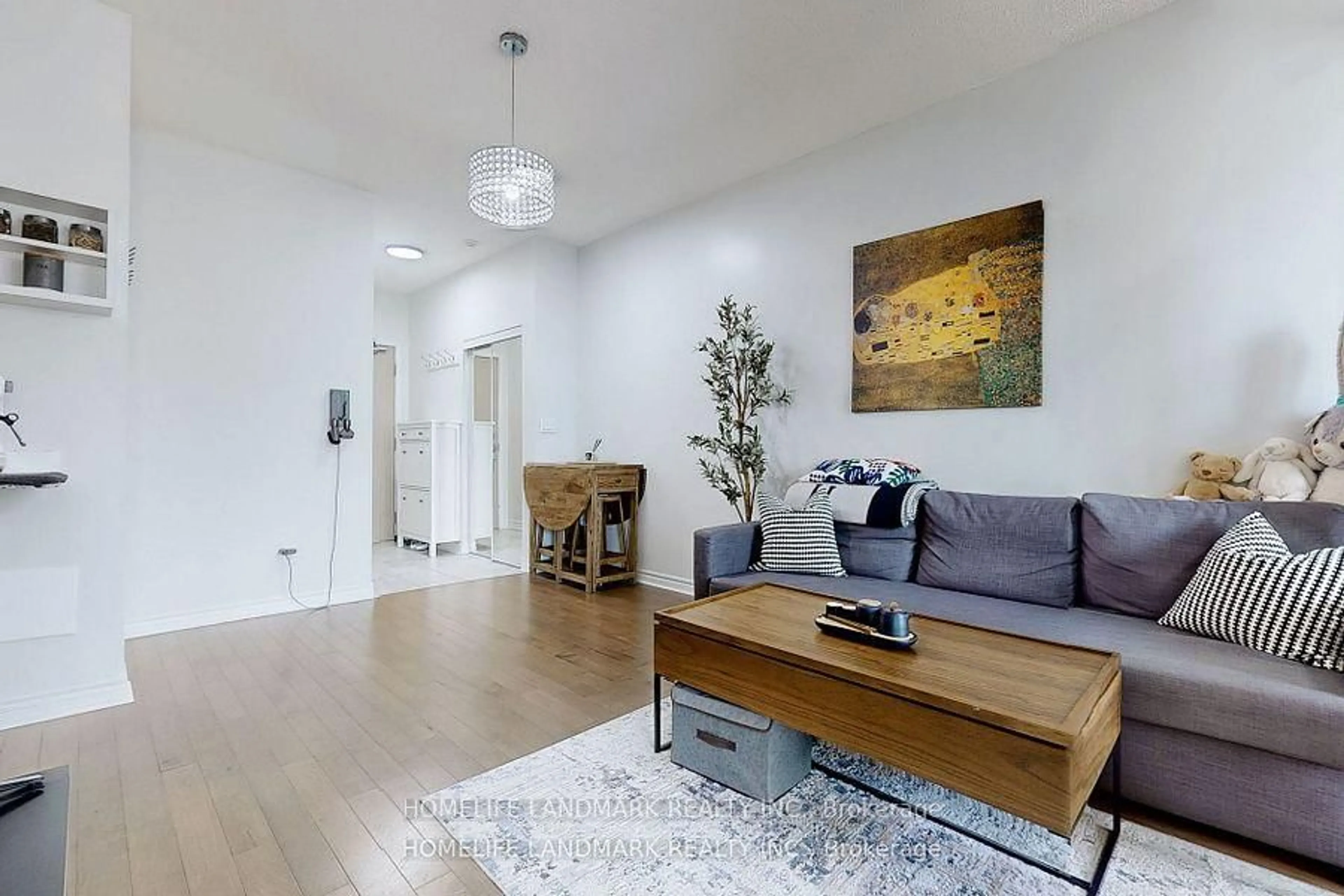 Living room with furniture, wood/laminate floor for 18 Holmes Ave #315, Toronto Ontario M2N 4L9