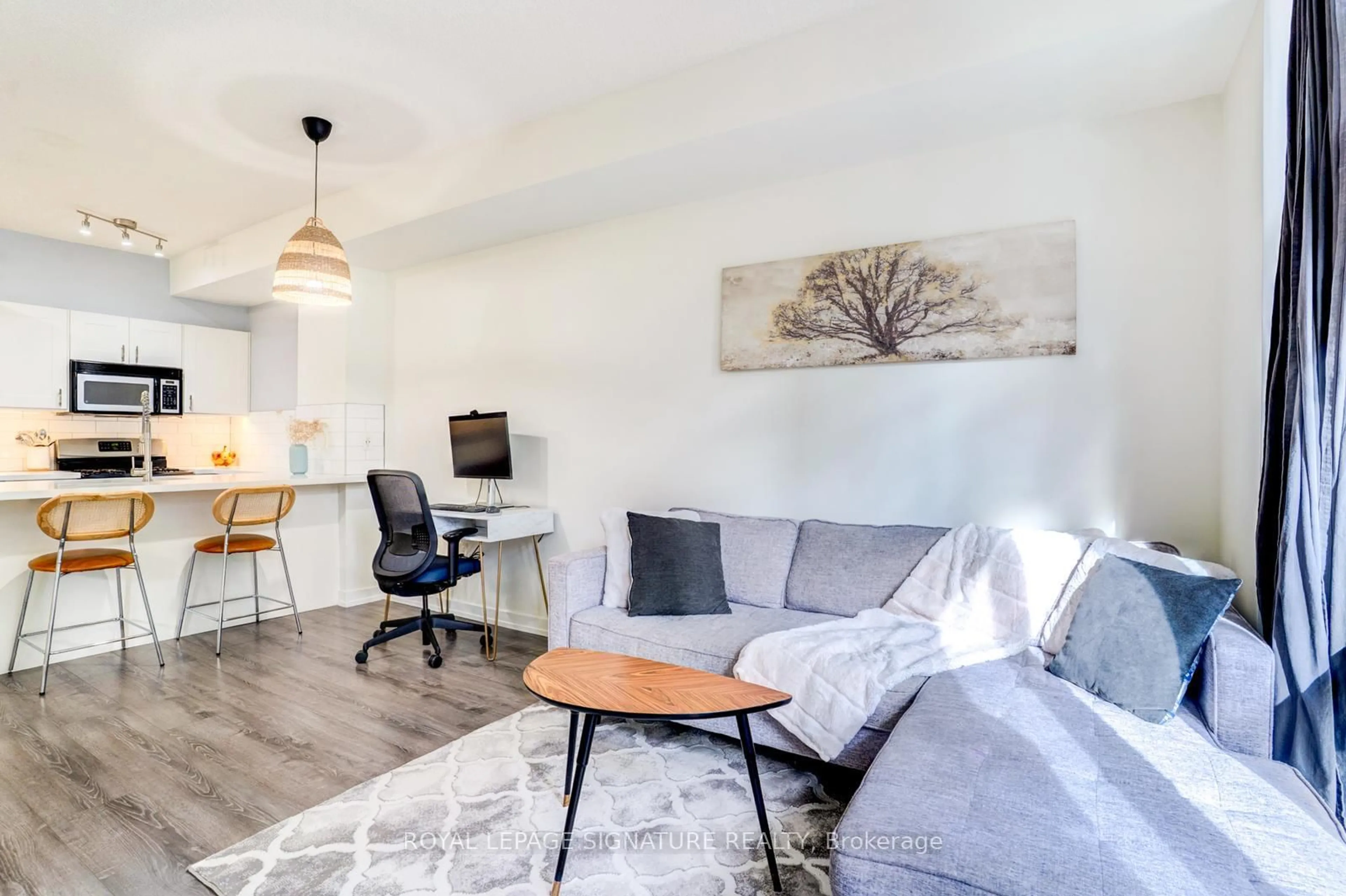 Living room with furniture, wood/laminate floor for 9 Spadina Ave #M09, Toronto Ontario M5V 3V5