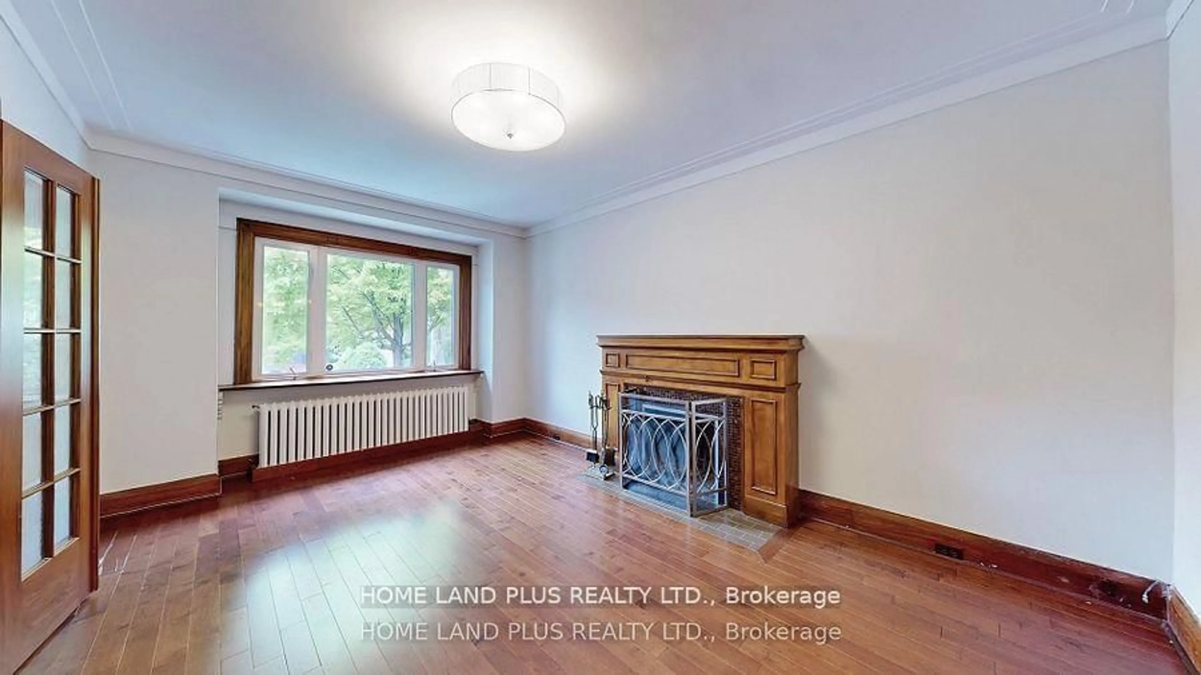 Living room with furniture, wood/laminate floor for 97 Deloraine Ave, Toronto Ontario M5M 2B1