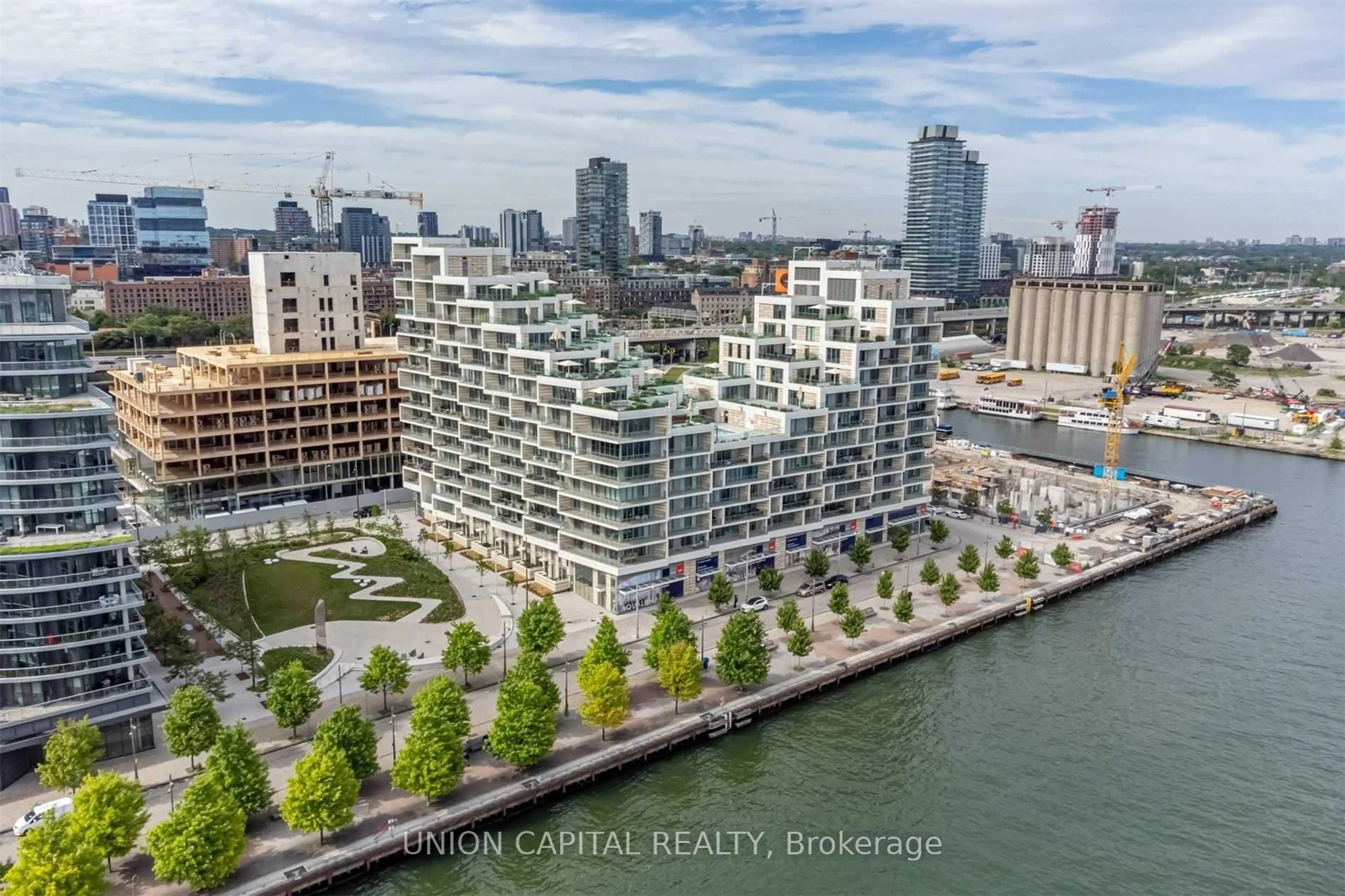 A pic from outside/outdoor area/front of a property/back of a property/a pic from drone, water/lake/river/ocean view for 118 Merchants Wharf Ave #418, Toronto Ontario M5A 0L3