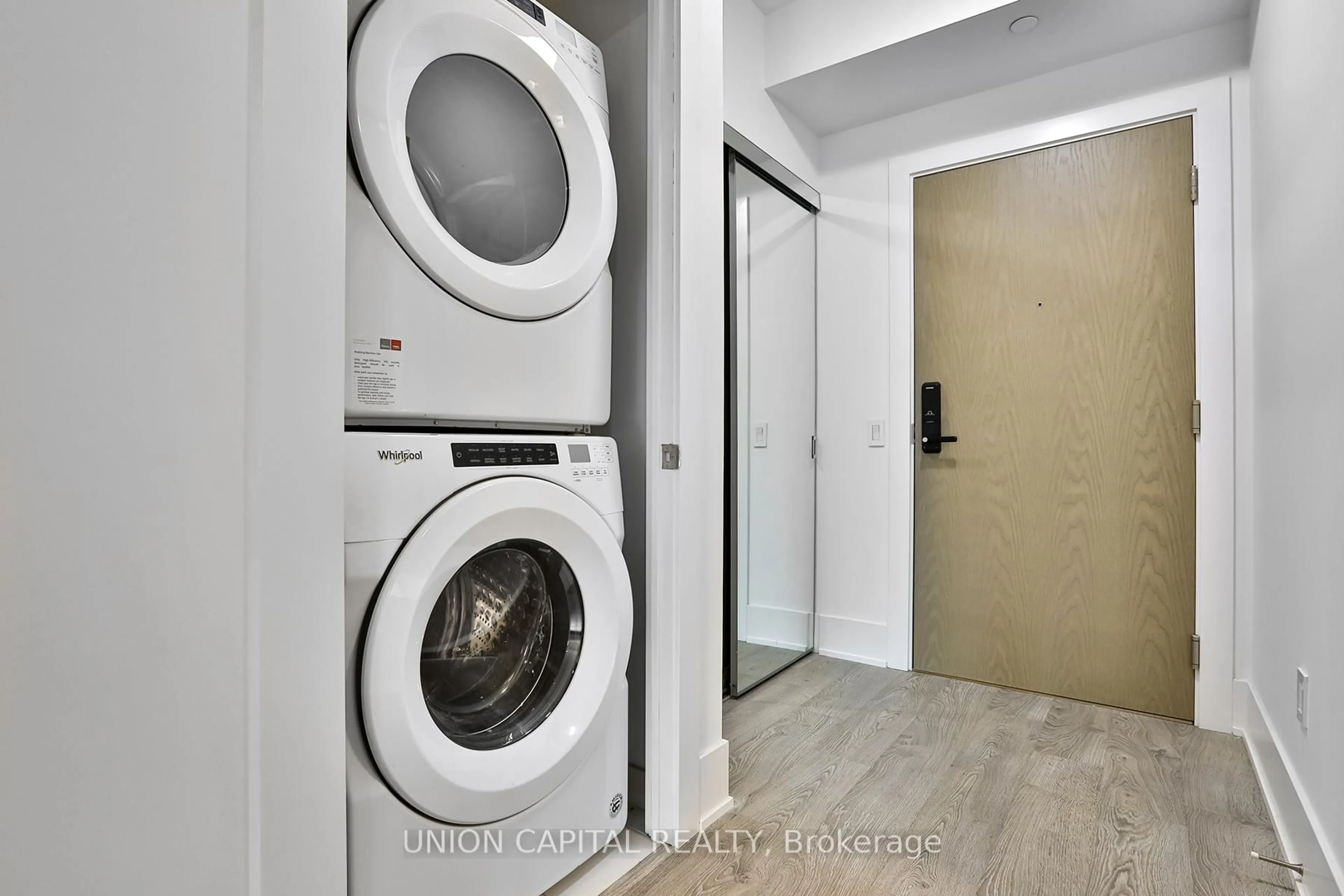Laundry room for 118 Merchants Wharf Ave #418, Toronto Ontario M5A 0L3