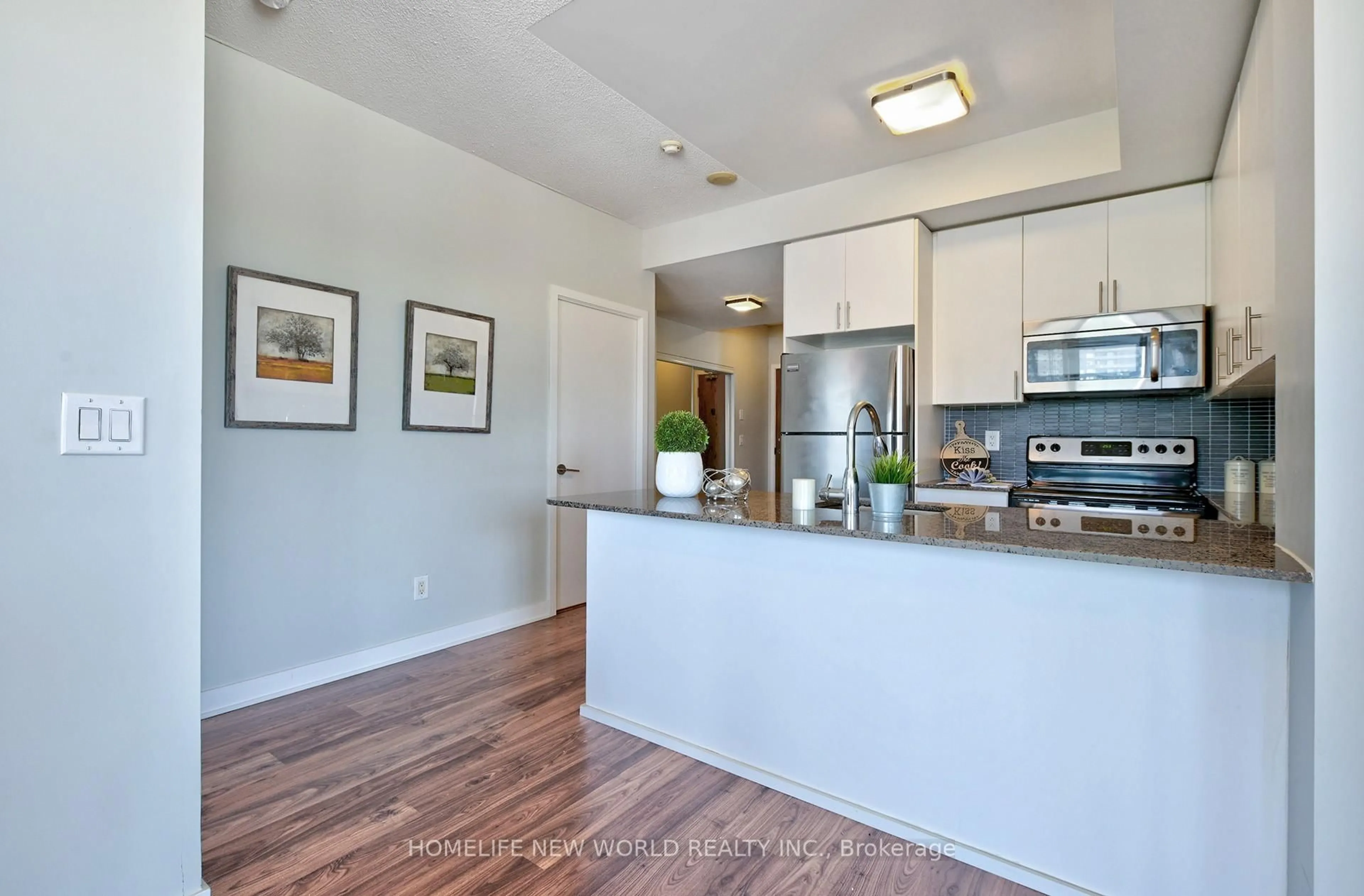 Open concept kitchen, wood/laminate floor for 260 Sackville St #505, Toronto Ontario M5A 0B3