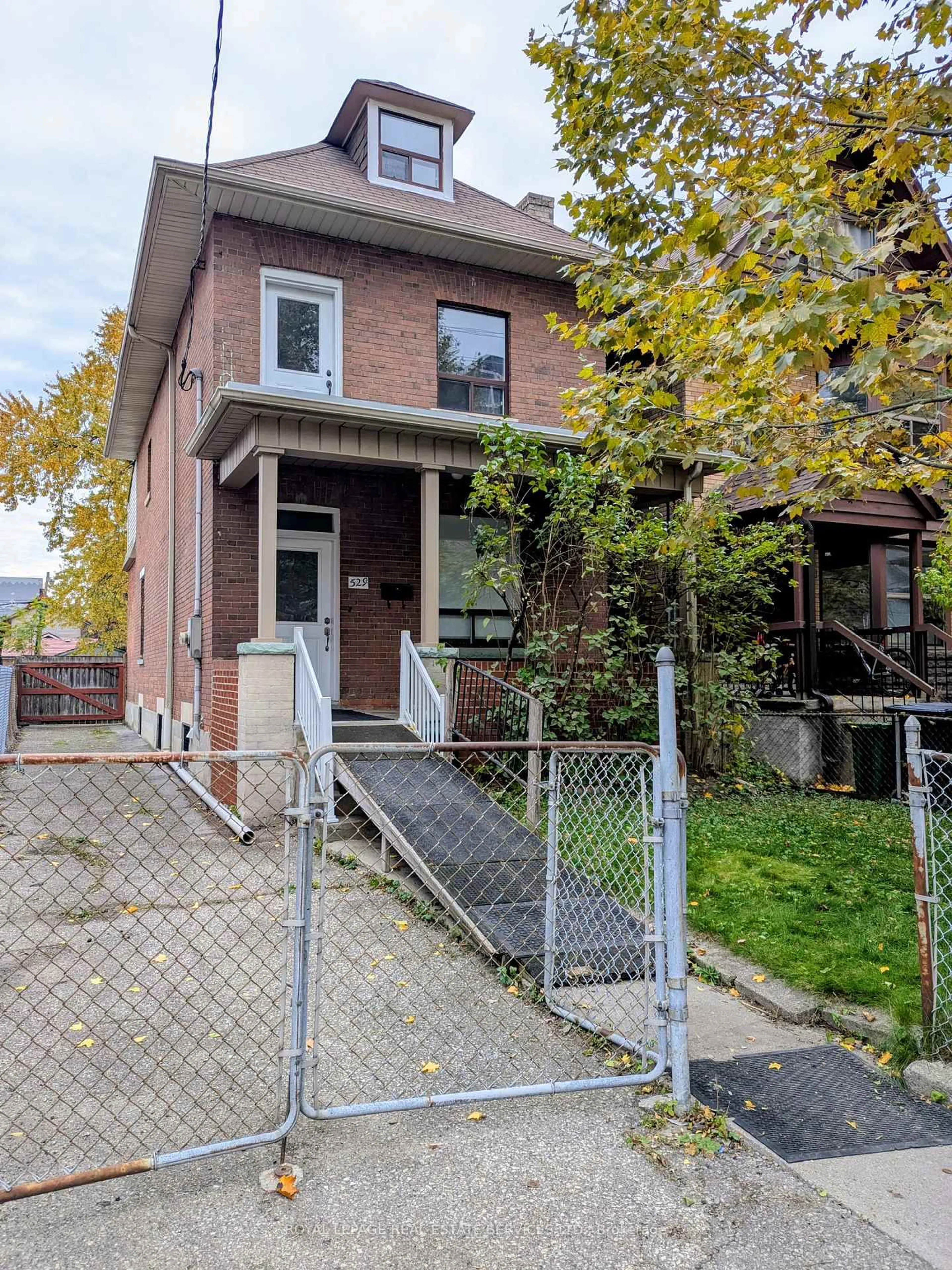 Home with brick exterior material, street for 529 Gladstone Ave, Toronto Ontario M6H 3J1