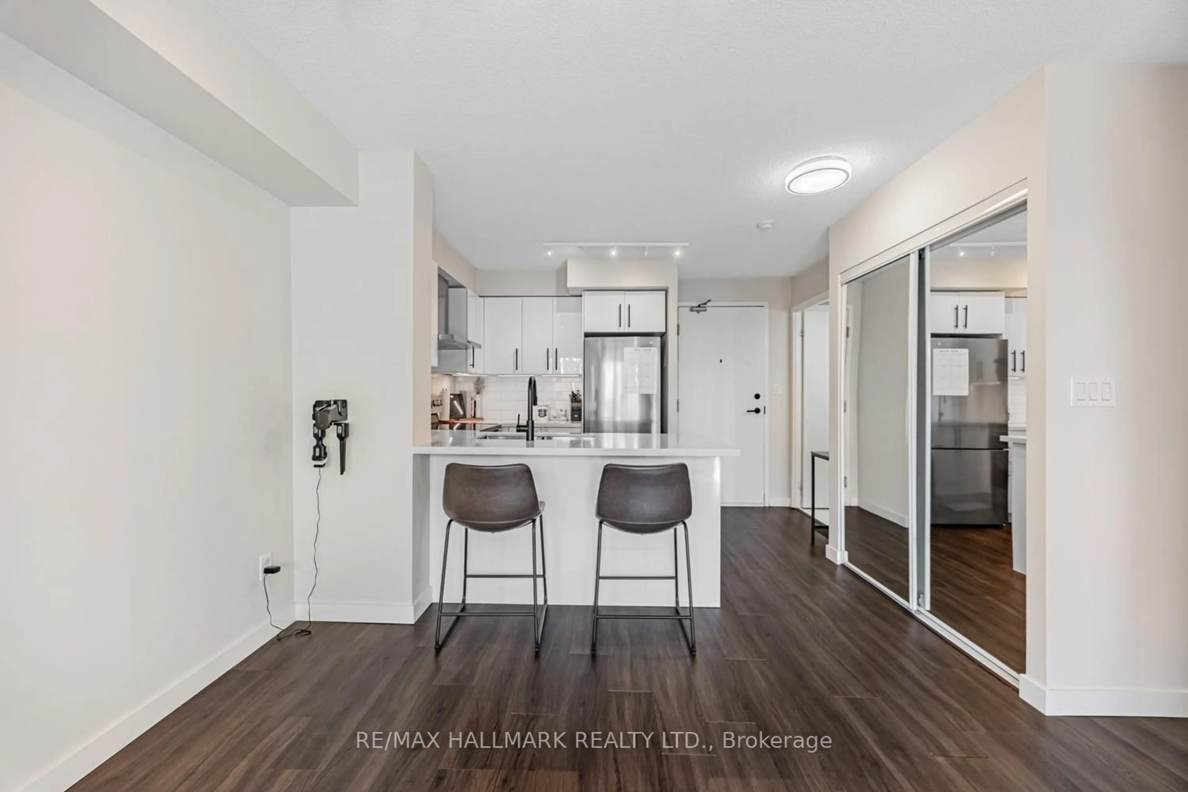Open concept kitchen, wood/laminate floor for 120 Dallimore Circ #510, Toronto Ontario M3C 4J1
