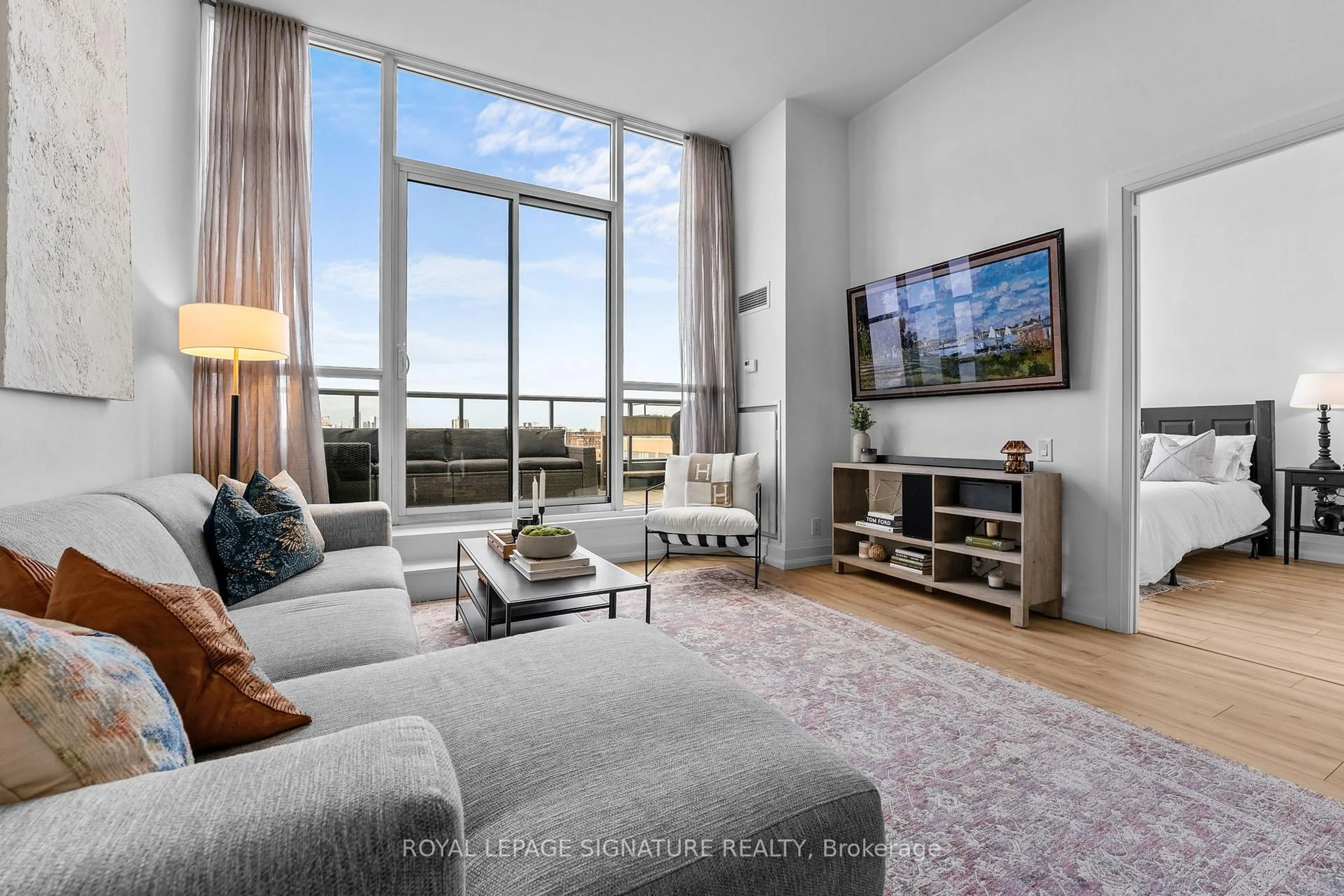 Living room with furniture, unknown for 5 Hanna Ave #PH09, Toronto Ontario M6K 0B3