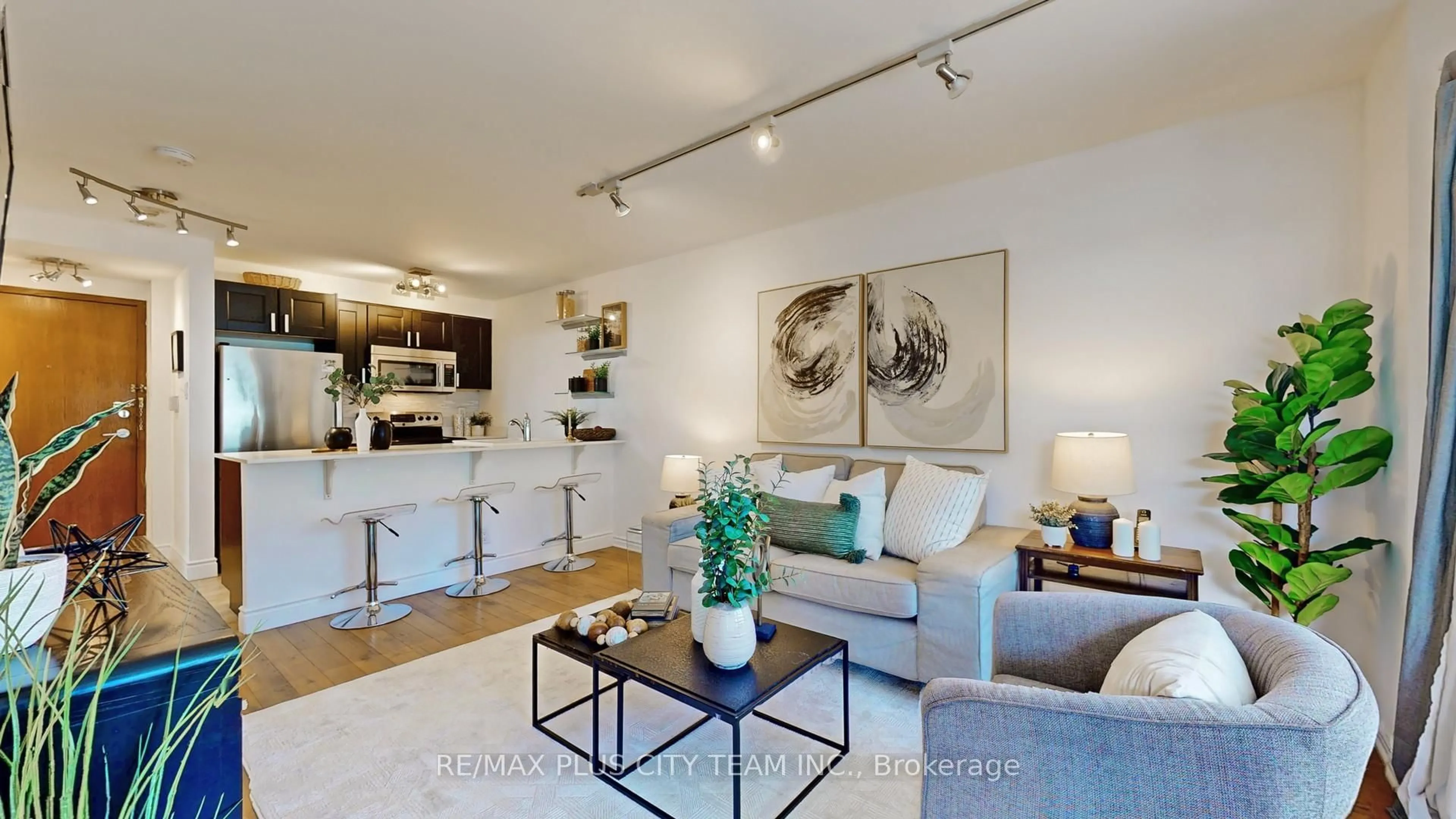 Living room with furniture, unknown for 10 Yonge St #310, Toronto Ontario M5E 1R4