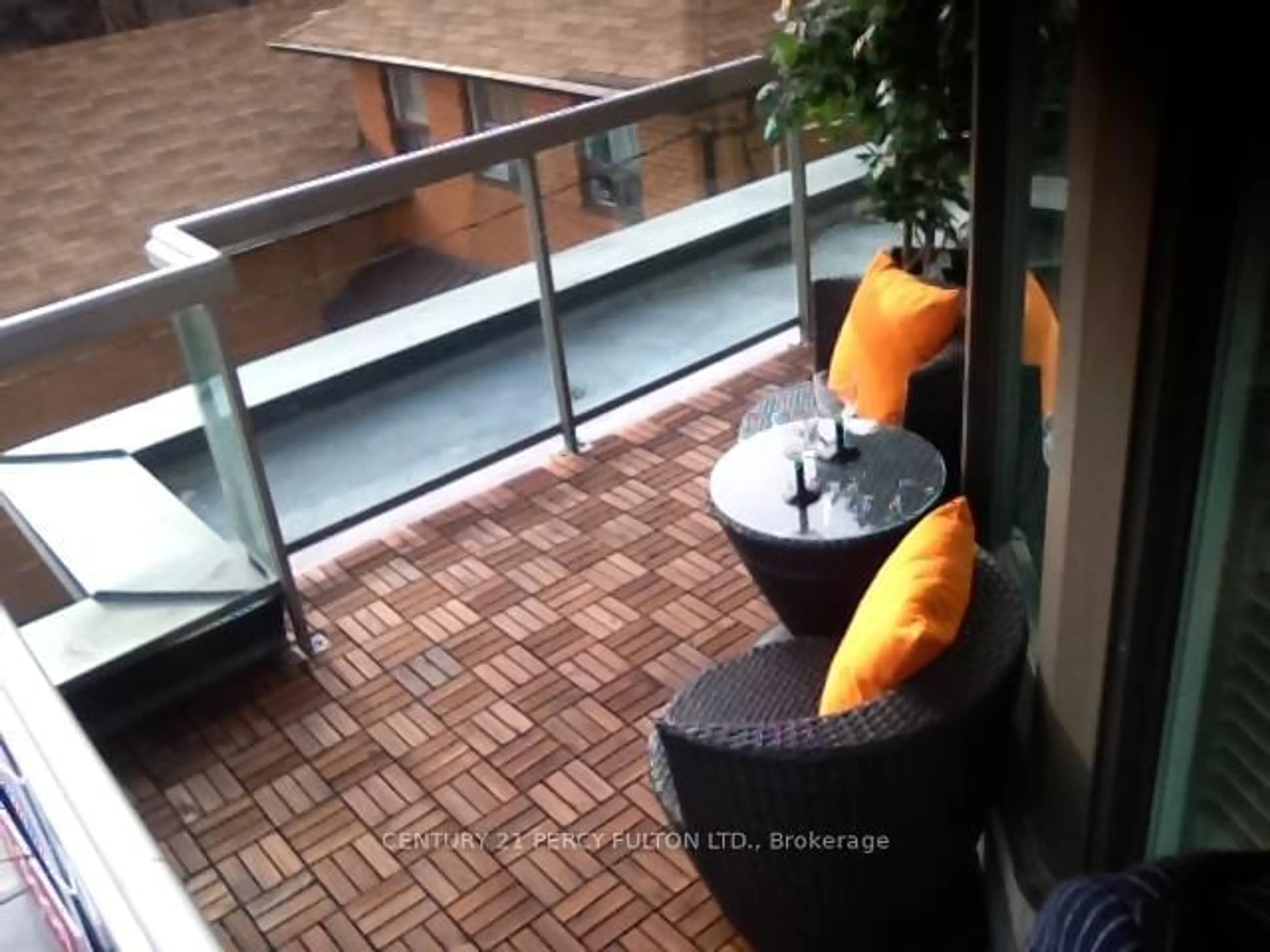 Patio, city buildings view from balcony for 1030 Sheppard Ave #212, Toronto Ontario M3H 6C1