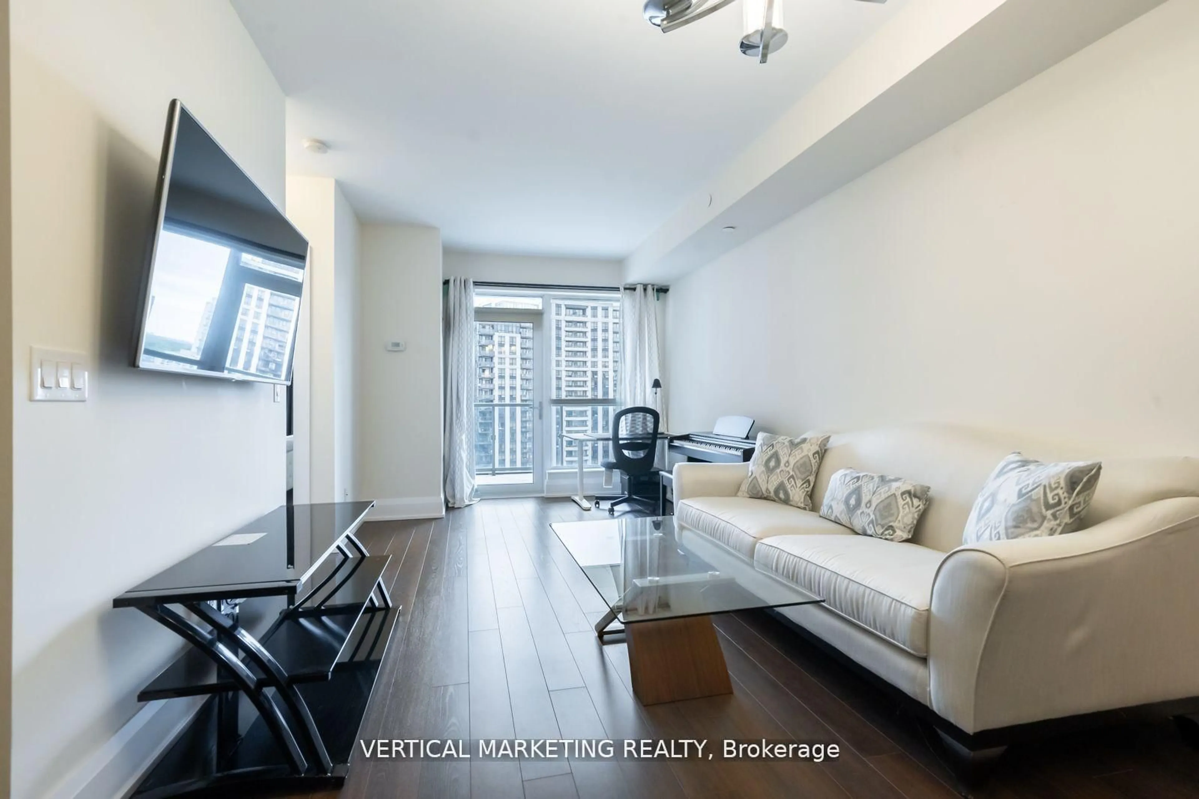 Living room with furniture, wood/laminate floor for 120 Harrison Garden Blvd #1310, Toronto Ontario M2N 0H1