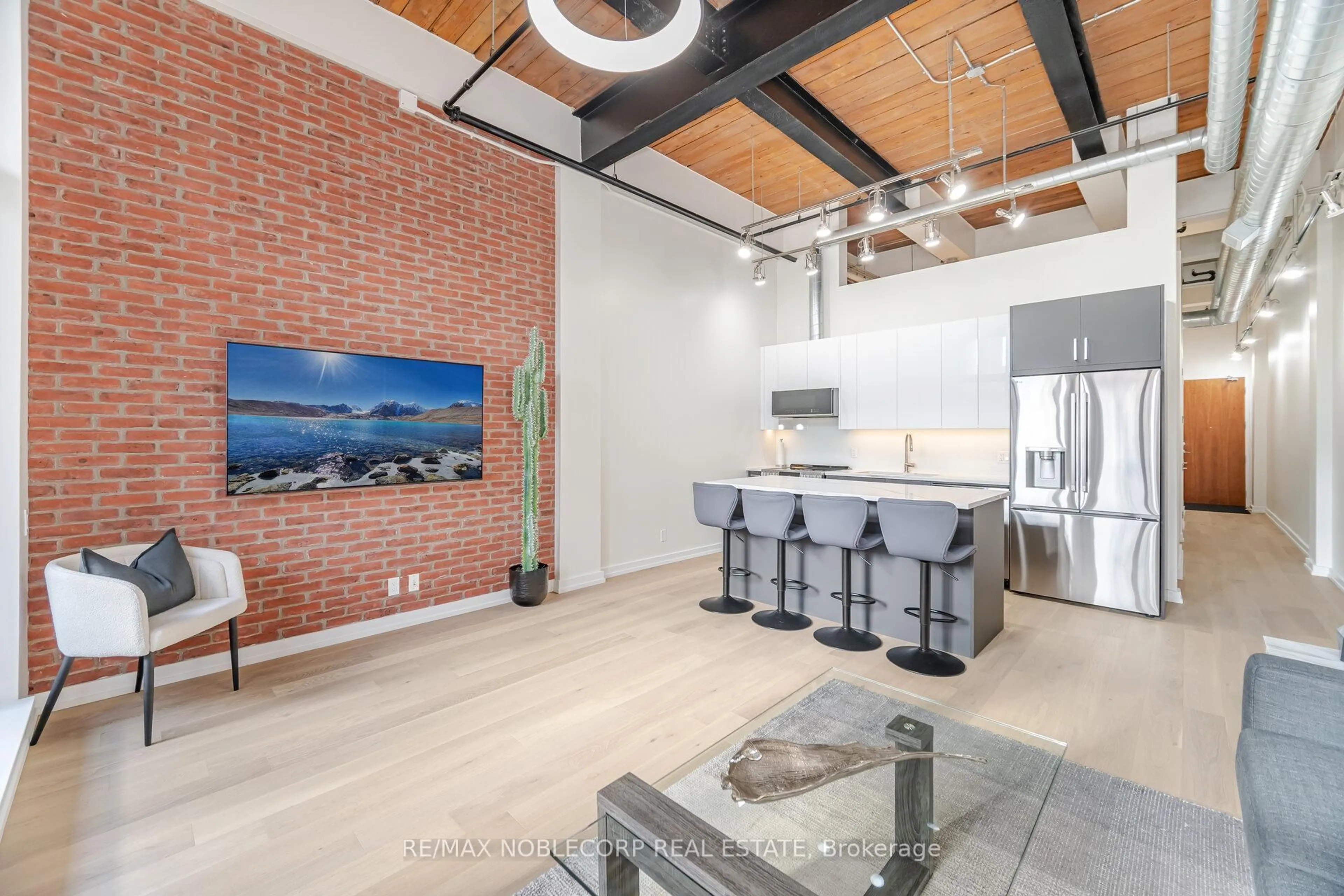 Open concept kitchen, ceramic/tile floor for 43 Hanna Ave #119, Toronto Ontario M6K 1X1