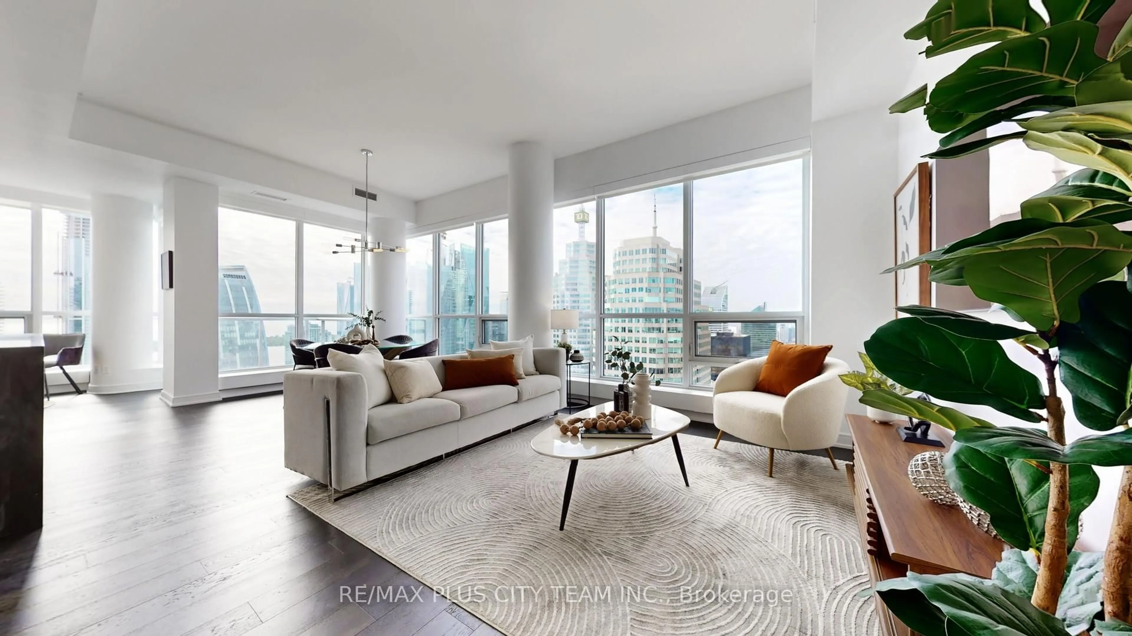 Living room with furniture, unknown for 88 Scott St #5504, Toronto Ontario M5E 0A9