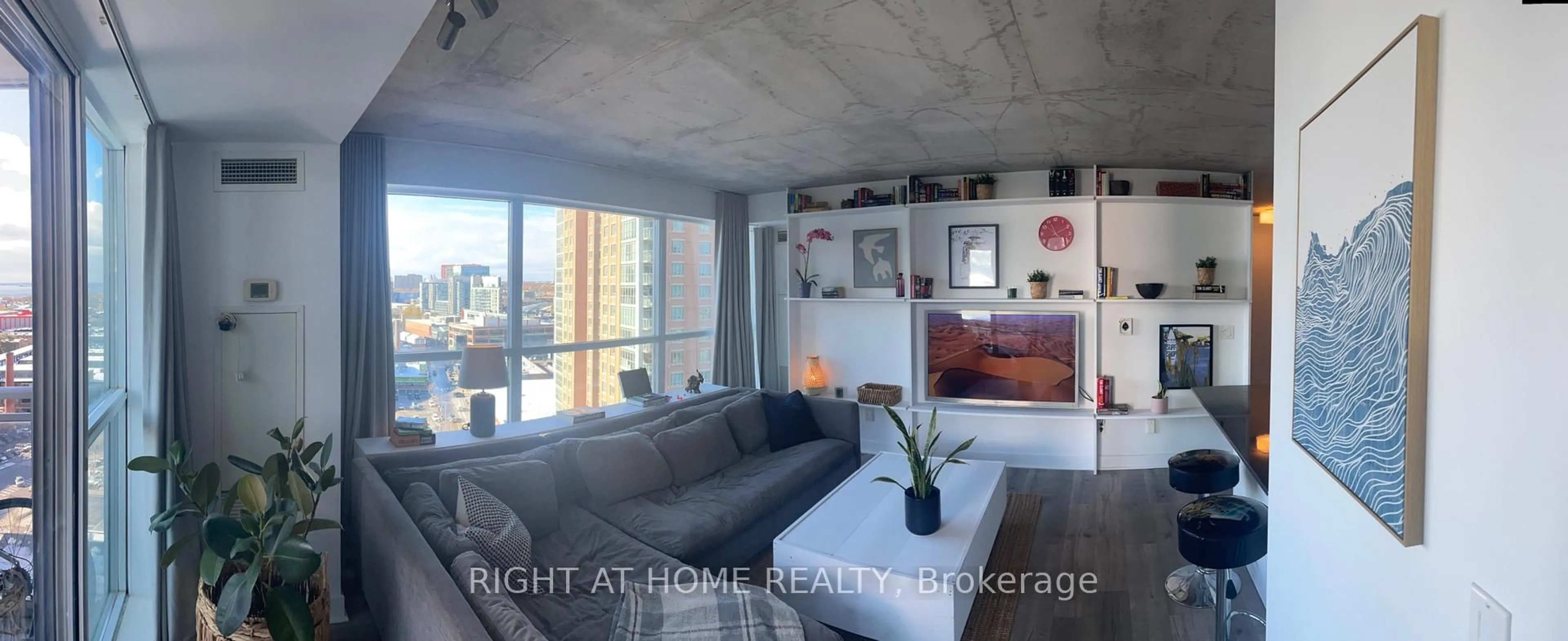 Living room with furniture, cement floor for 100 Western Battery Rd #1603, Toronto Ontario M6K 3S2