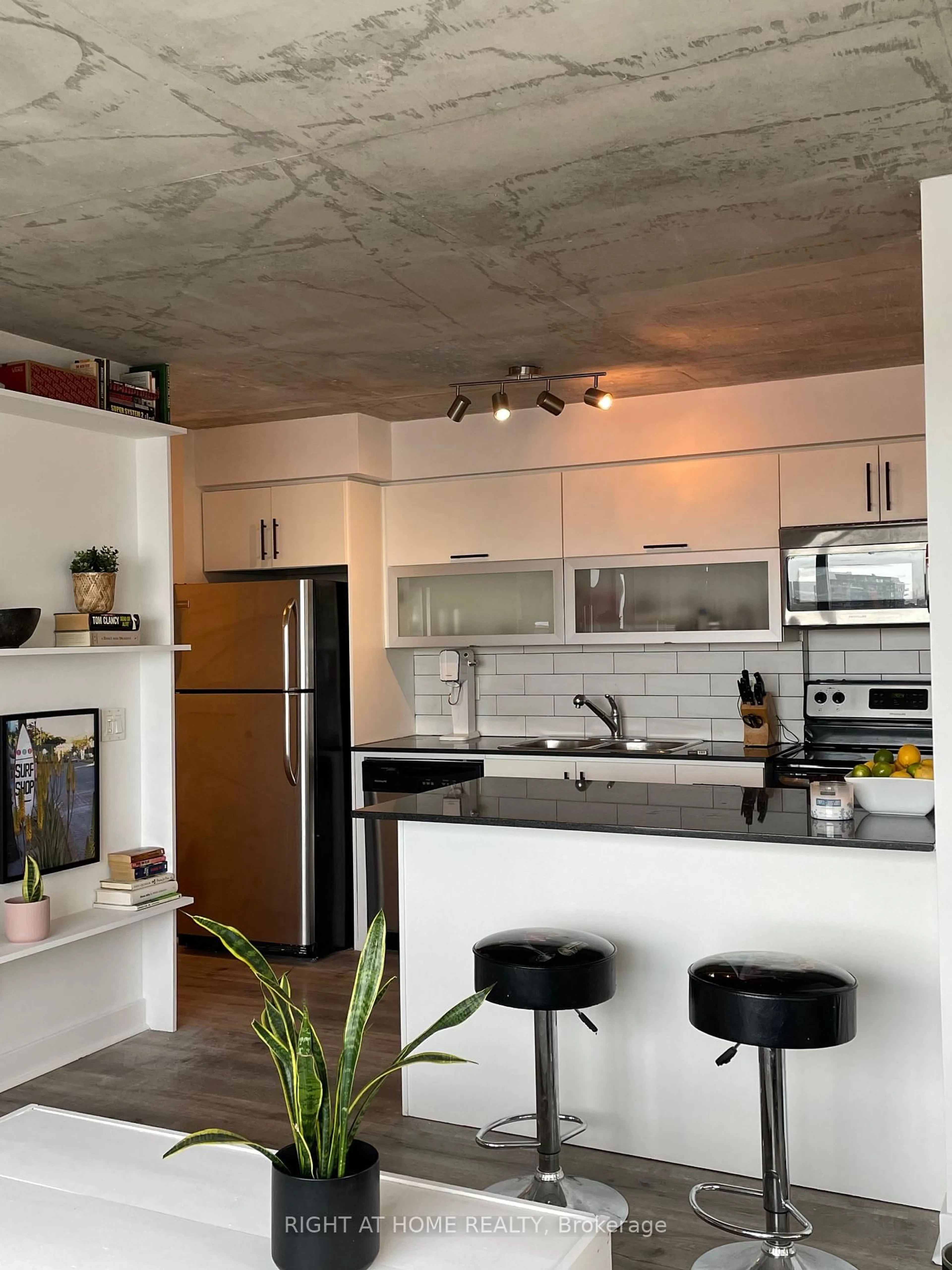 Open concept kitchen, cement floor for 100 Western Battery Rd #1603, Toronto Ontario M6K 3S2