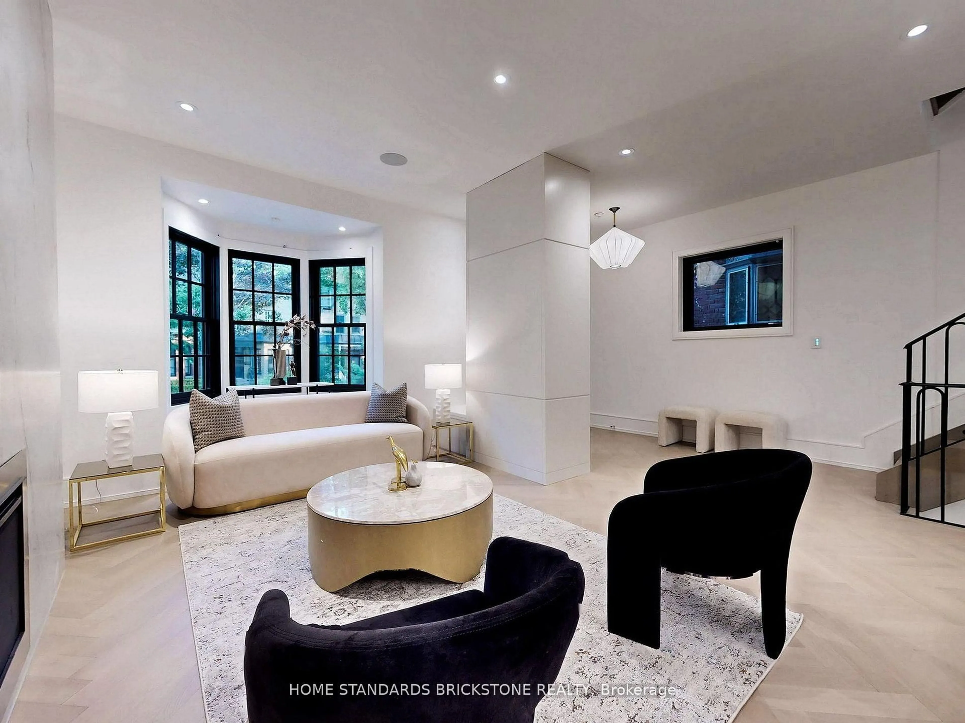 Living room with furniture, ceramic/tile floor for 38 Elgin Ave, Toronto Ontario M5R 1G6