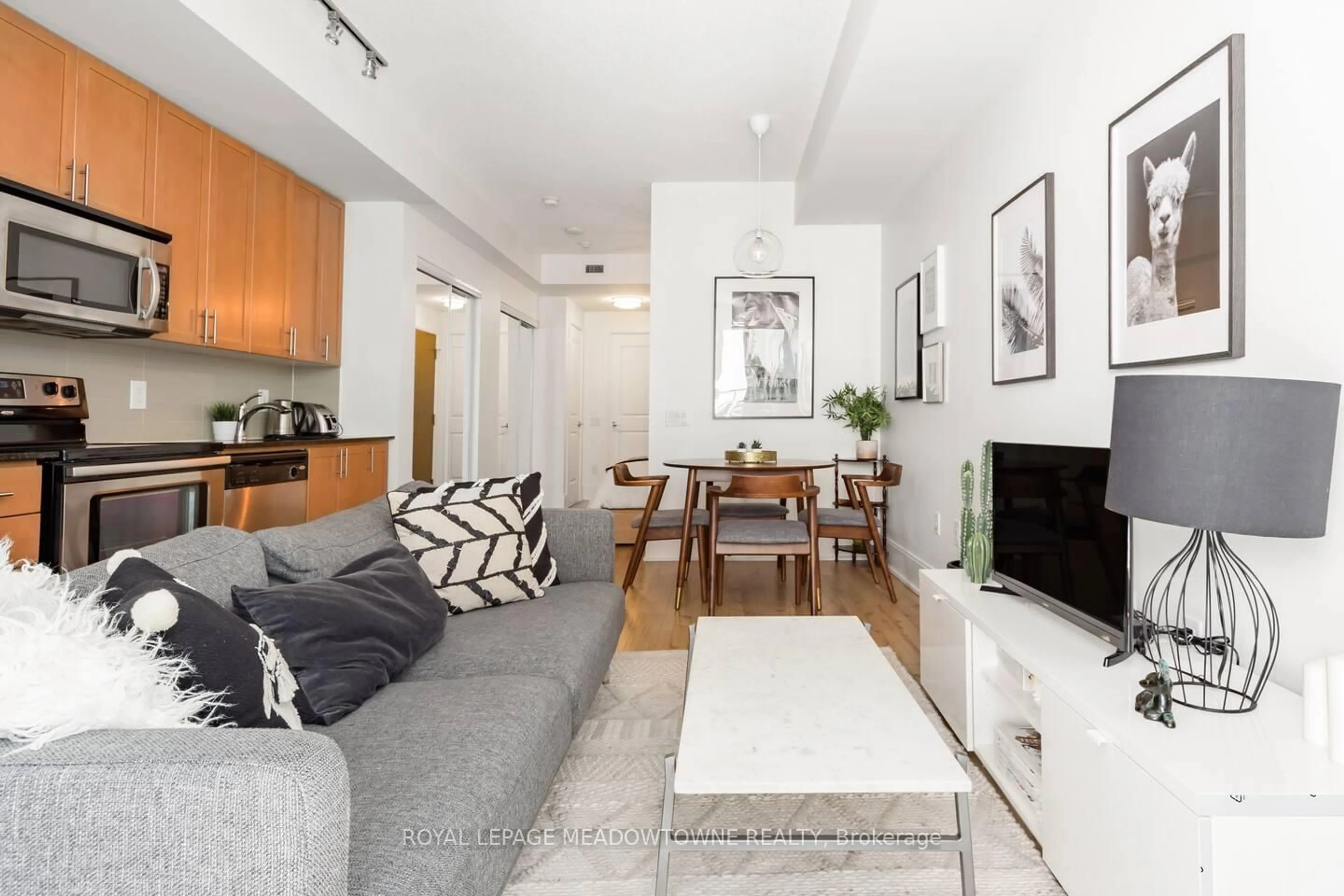 Living room with furniture, unknown for 560 Front St #210, Toronto Ontario M5V 1C1