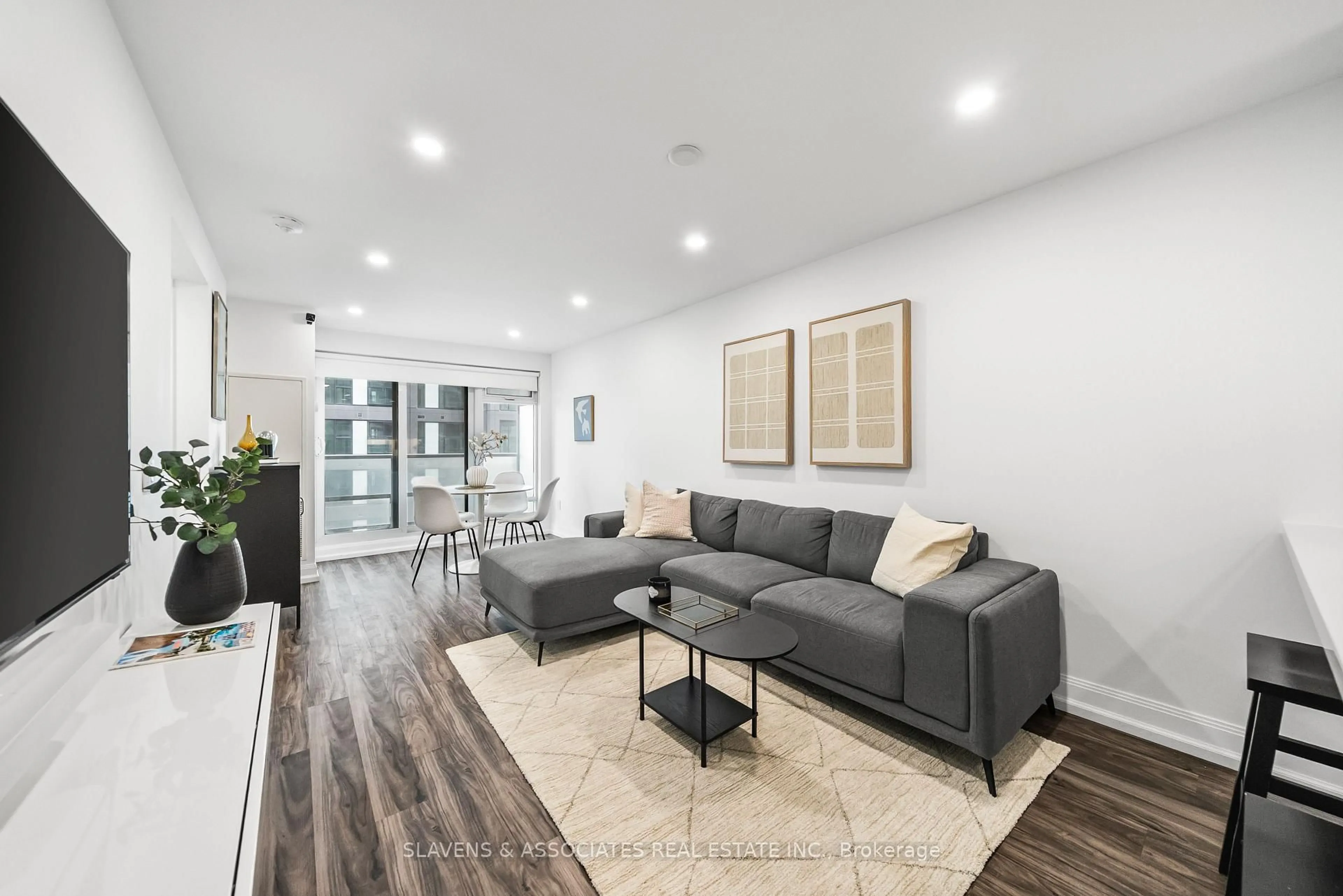 Living room with furniture, wood/laminate floor for 2181 Yonge St #2303, Toronto Ontario M4S 3H7