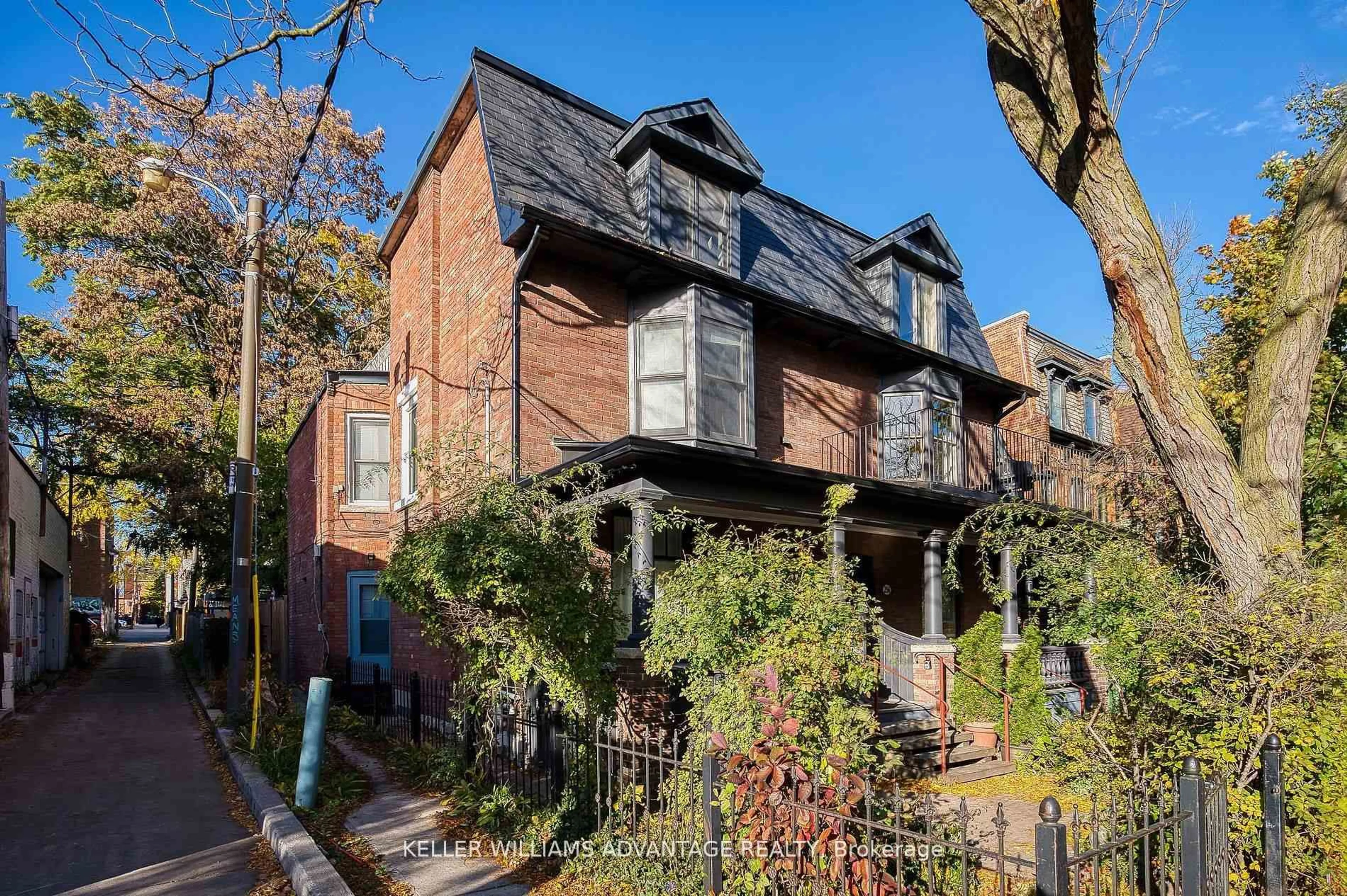 Home with brick exterior material, street for 254A Carlton St, Toronto Ontario M5A 2L3