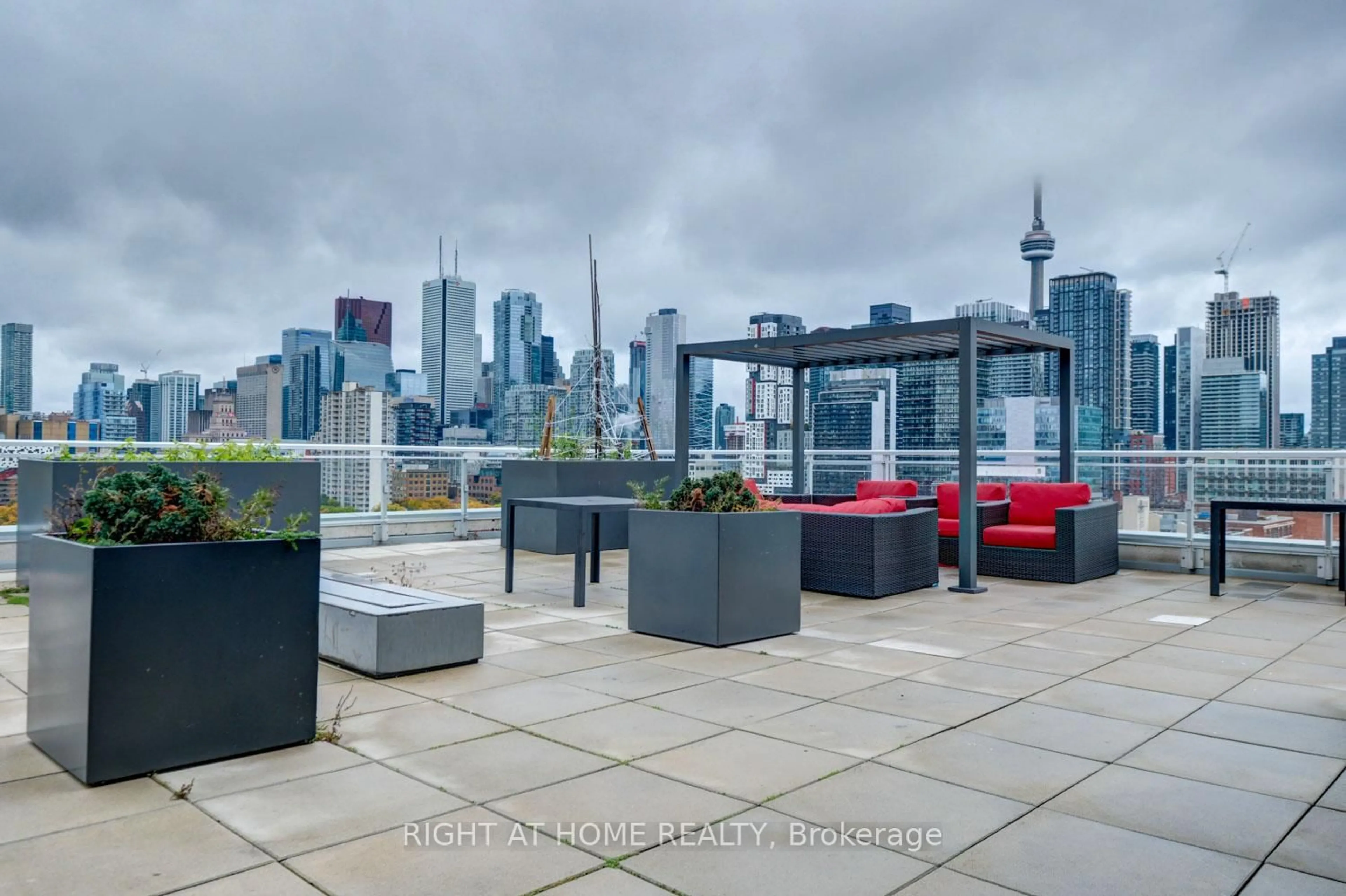 Patio, city buildings view from balcony for 10 Willison Sq #701, Toronto Ontario M5T 0A8