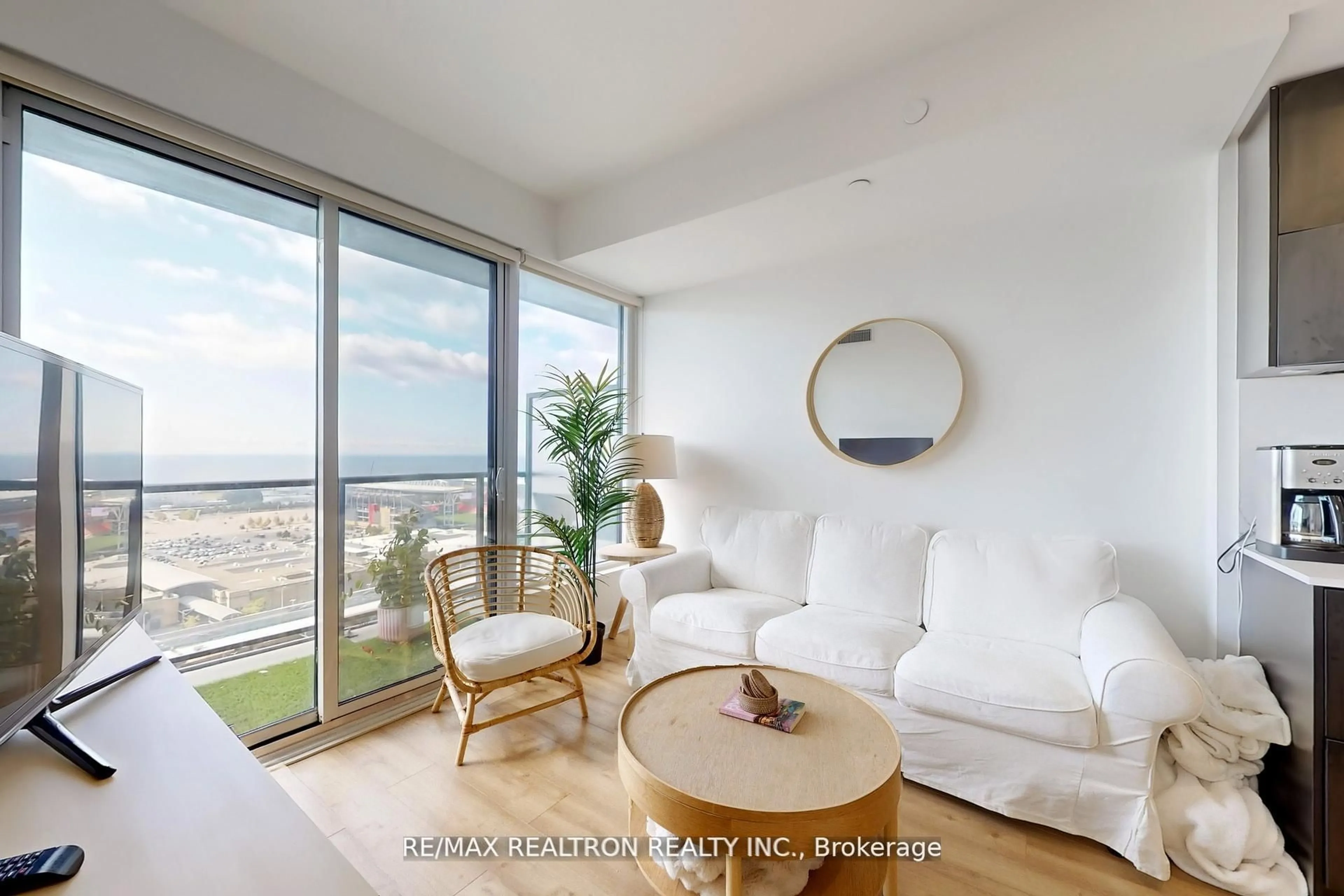 Living room with furniture, wood/laminate floor for 135 East Liberty St #1901, Toronto Ontario M6K 3K4