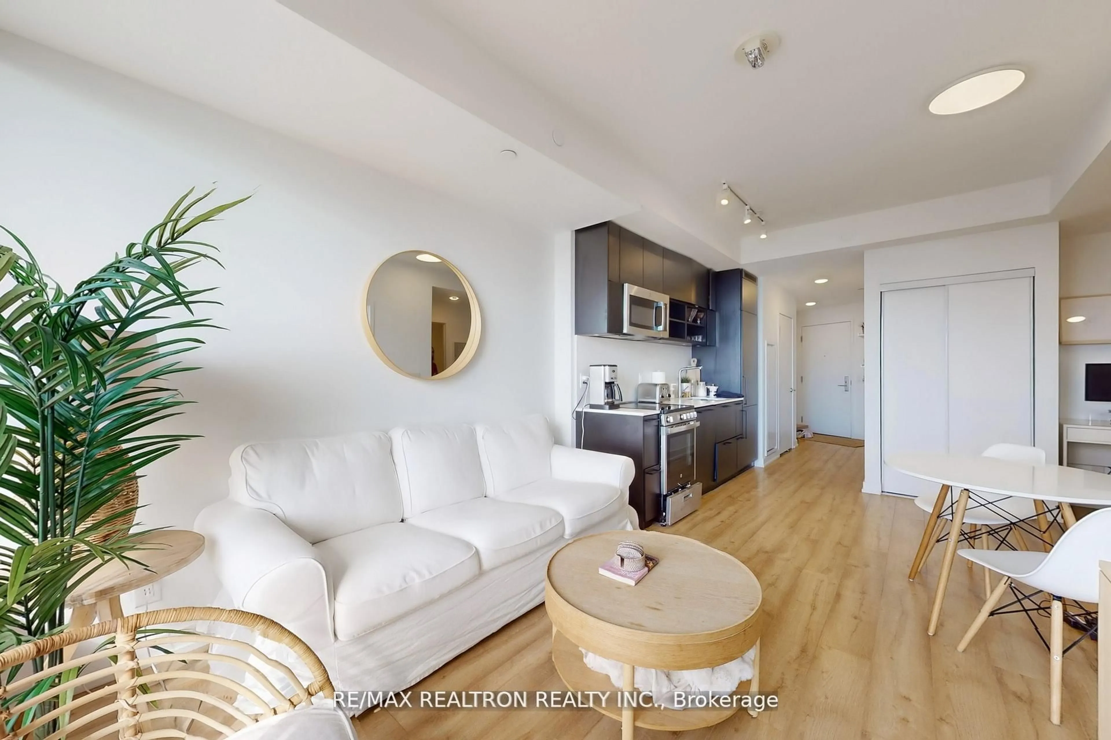Living room with furniture, wood/laminate floor for 135 East Liberty St #1901, Toronto Ontario M6K 3K4