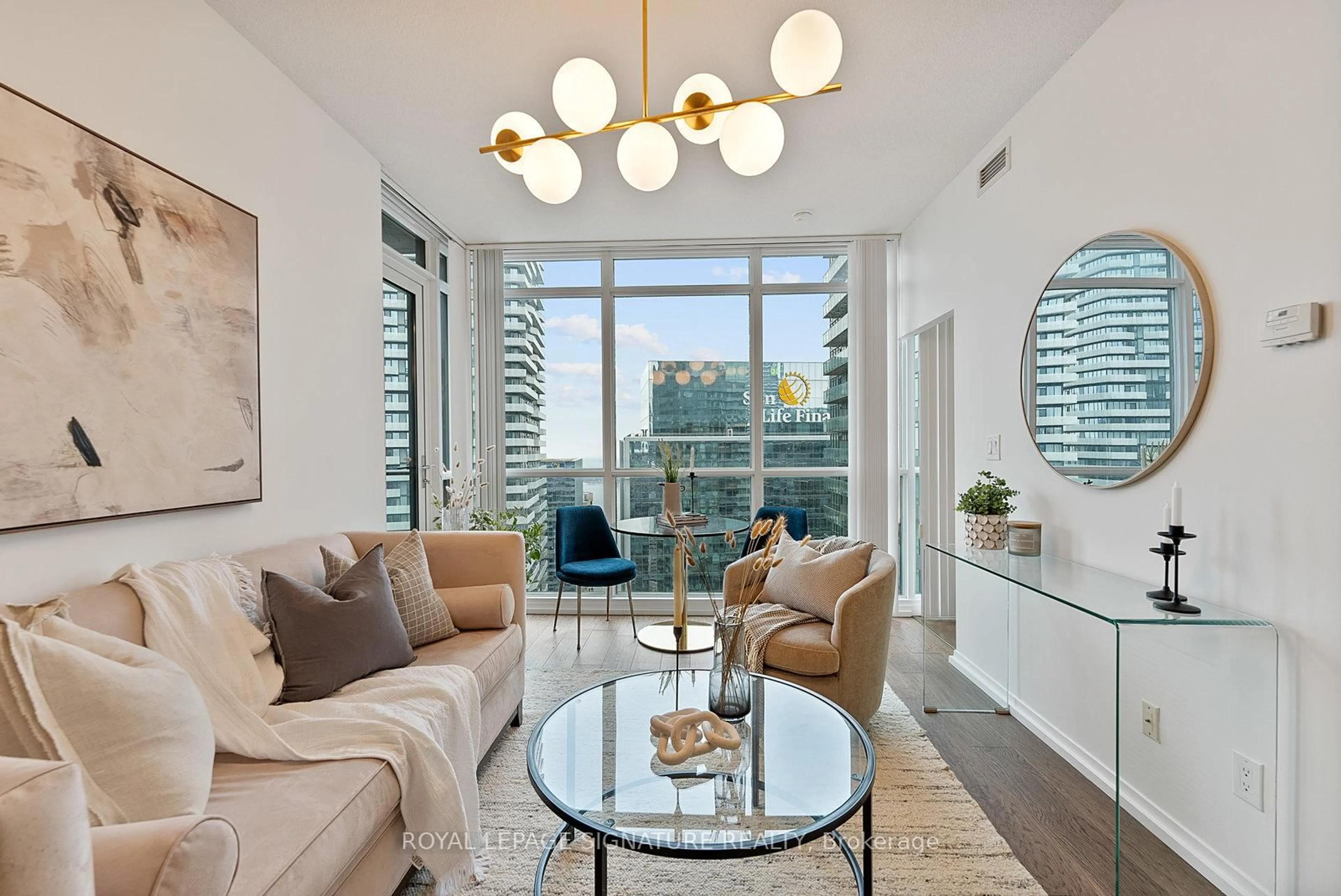 Living room with furniture, unknown for 65 Bremner Blvd #4301, Toronto Ontario M5J 0A7