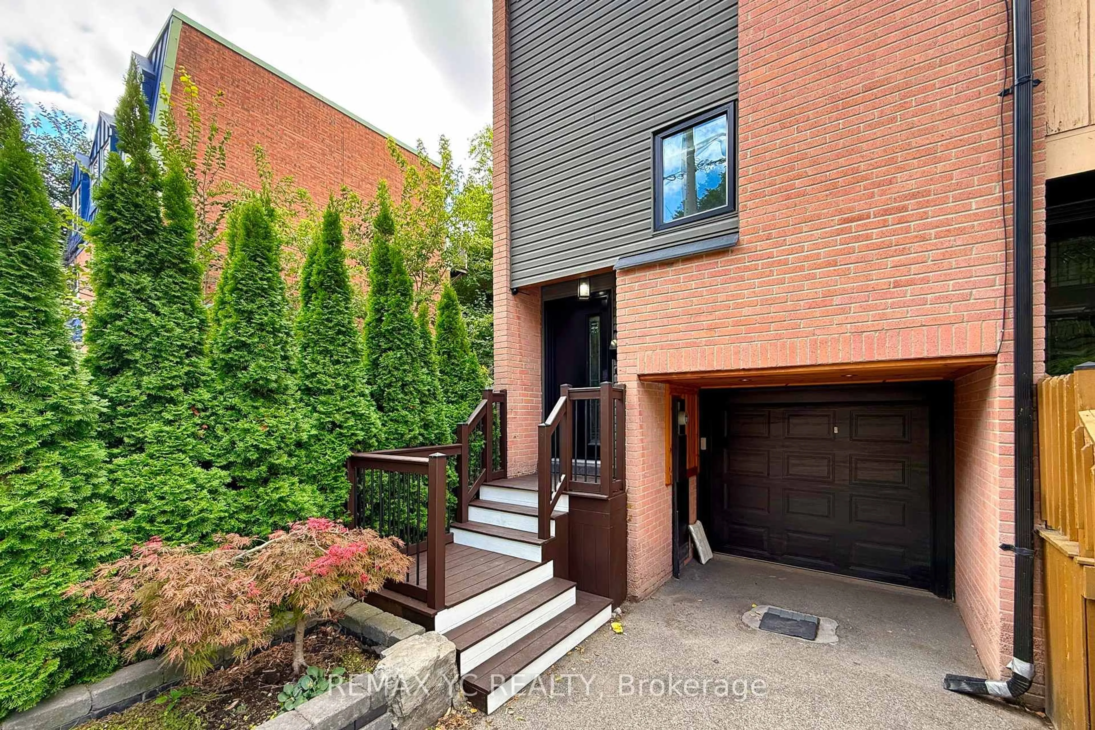 Home with brick exterior material, street for 242 Milan St, Toronto Ontario M5A 3Z6