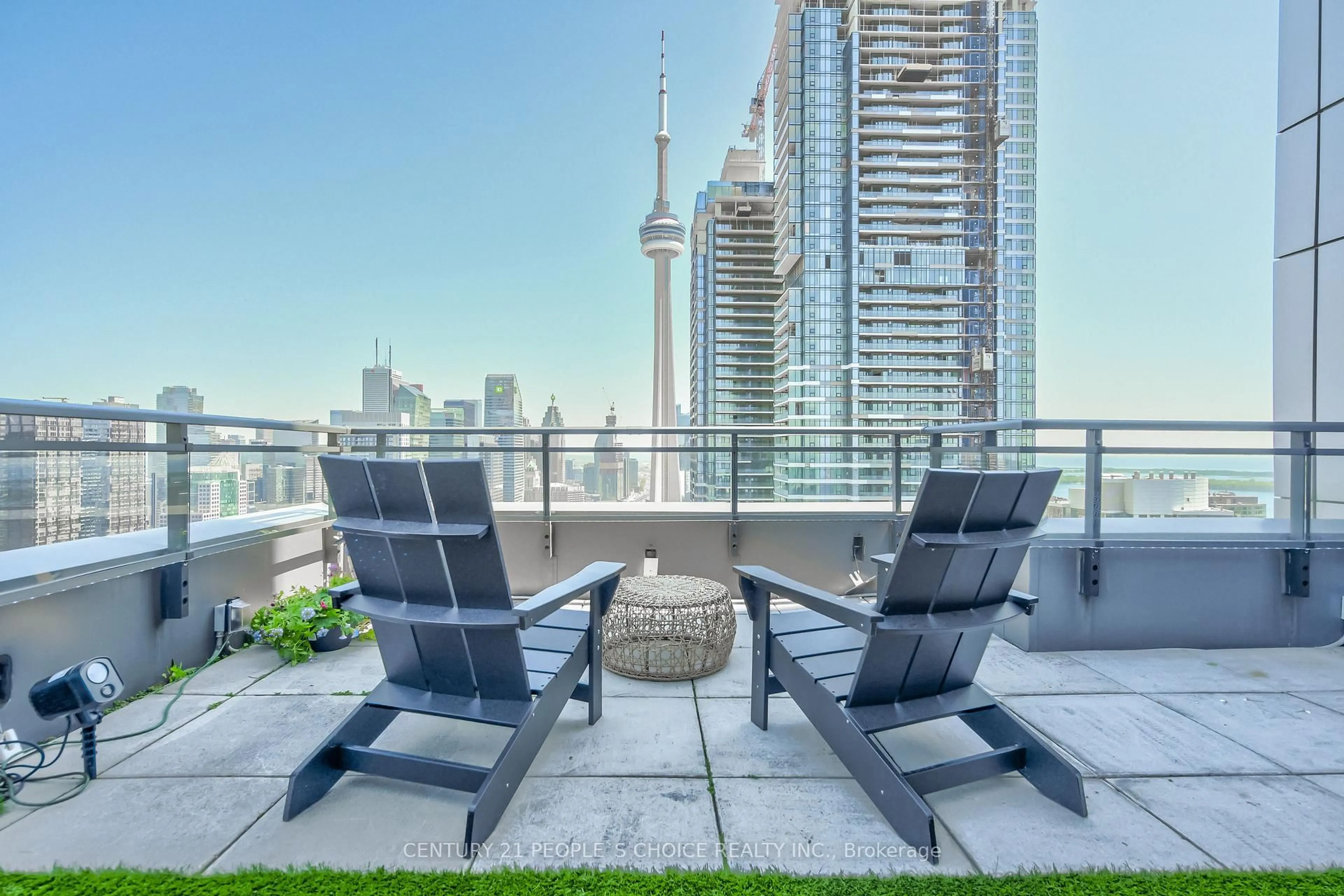 Patio, city buildings view from balcony for 25 Telegram Mews #PH5201, Toronto Ontario M5V 3Z1
