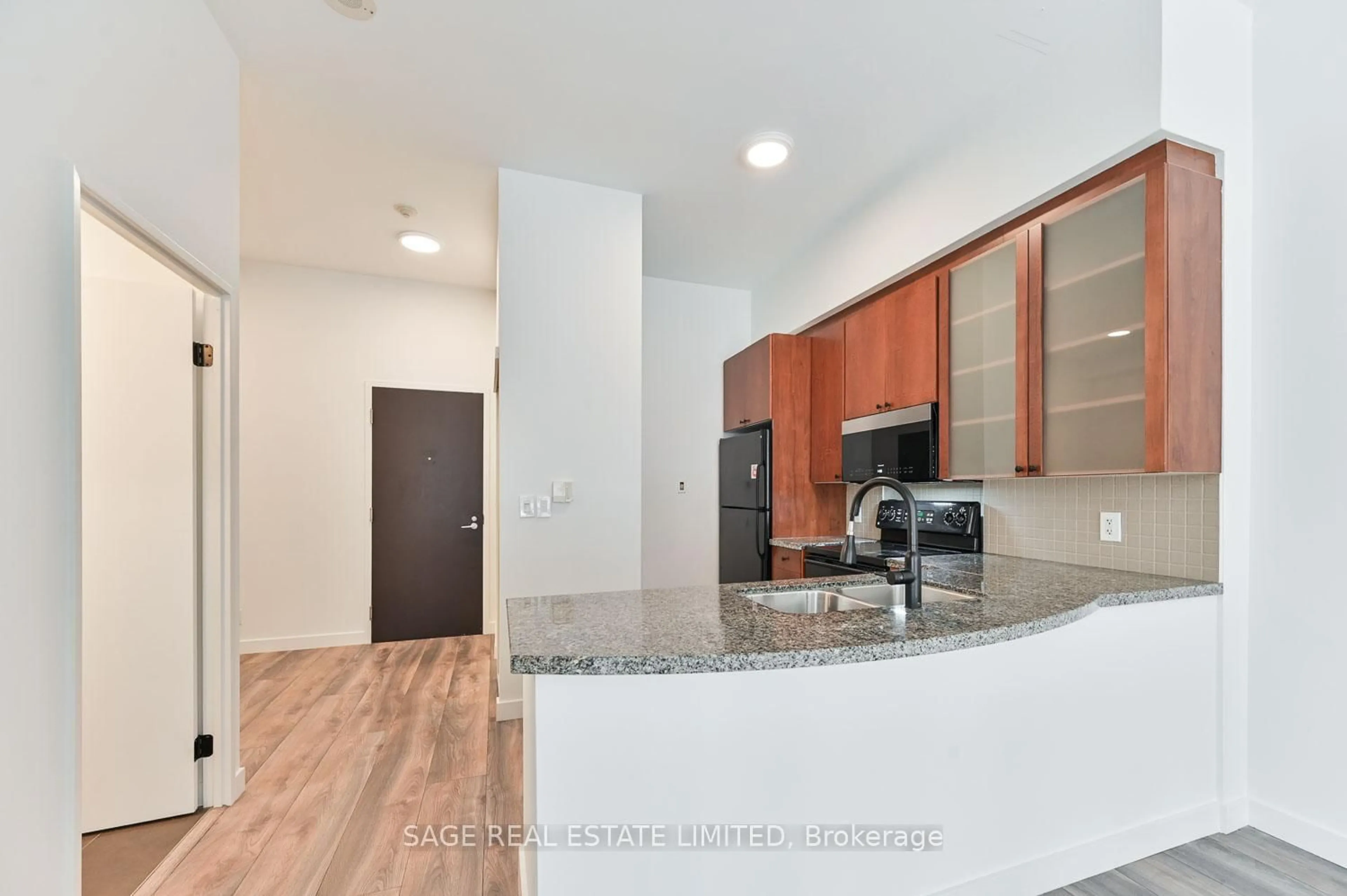 Open concept kitchen, unknown for 1005 King St #103, Toronto Ontario M6K 3M8